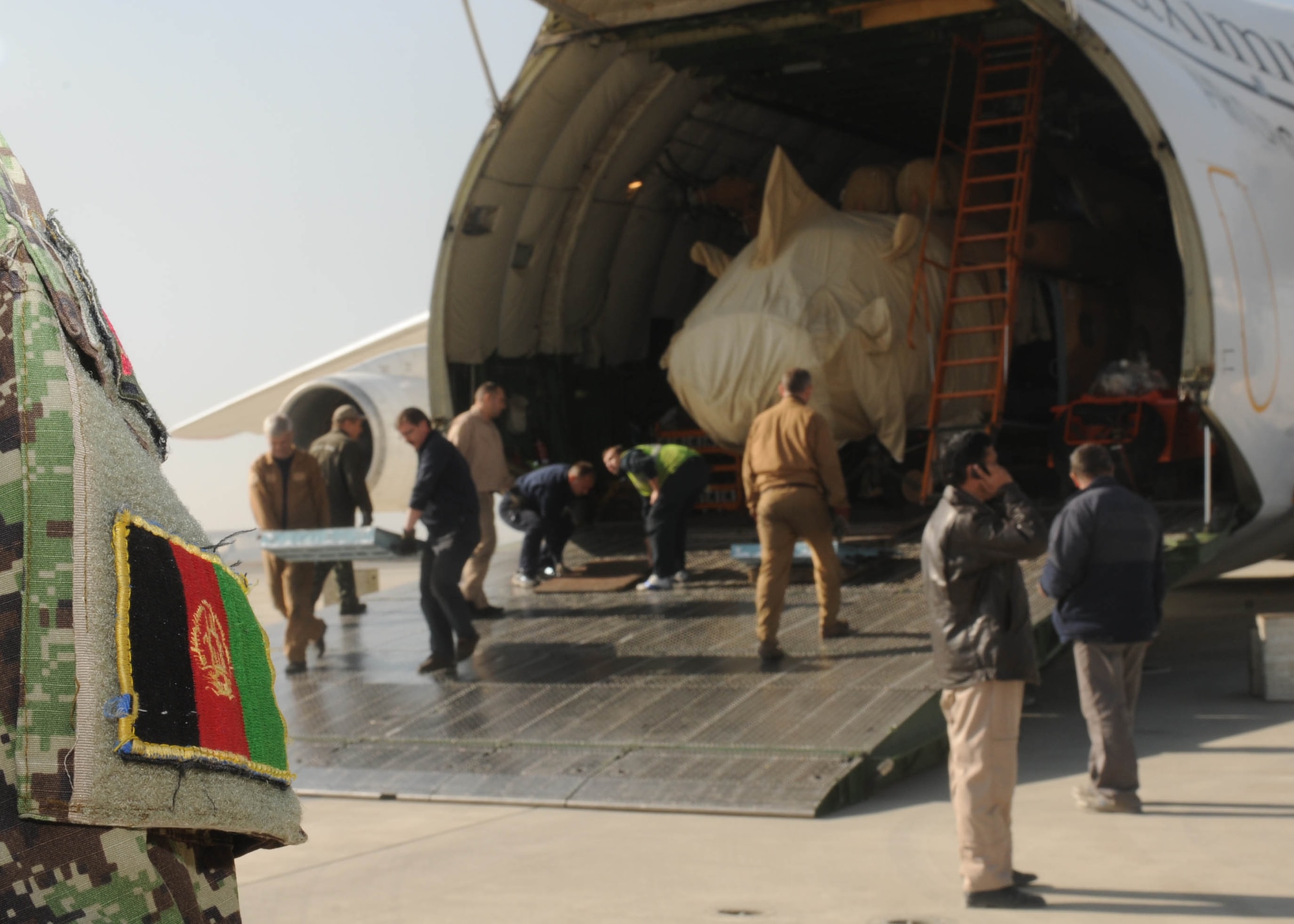 101210-N-9914P-001 KABUL, Afghanistan - The Afghan Air Force accepts delivery of four Mi-17s V5 helicopters at the air force base in Kabul  on Dec. 10.  (U.S. Navy photo by Mass Communication Specialist 2nd Class Vladimir Potapenko/ RELEASED).