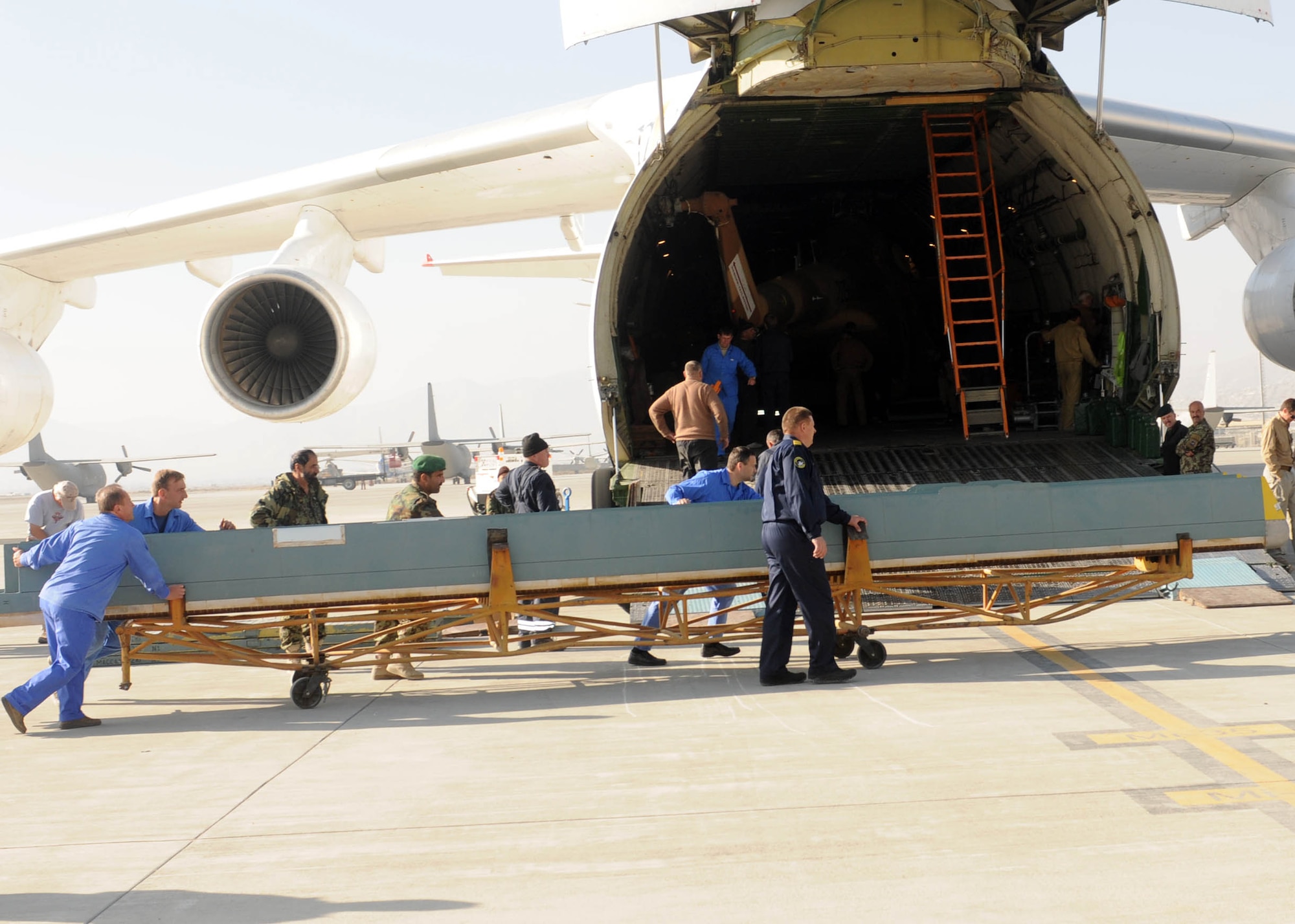 101210-N-6541W-005 KABUL, Afghanistan - The Afghan Air Force accepts delivery of four Mi-17s V5 helicopters at the air force base in Kabul  on Dec. 10.  (U.S. Navy photo by Mass Communication Specialist 2nd Class Vladimir Potapenko/ RELEASED).