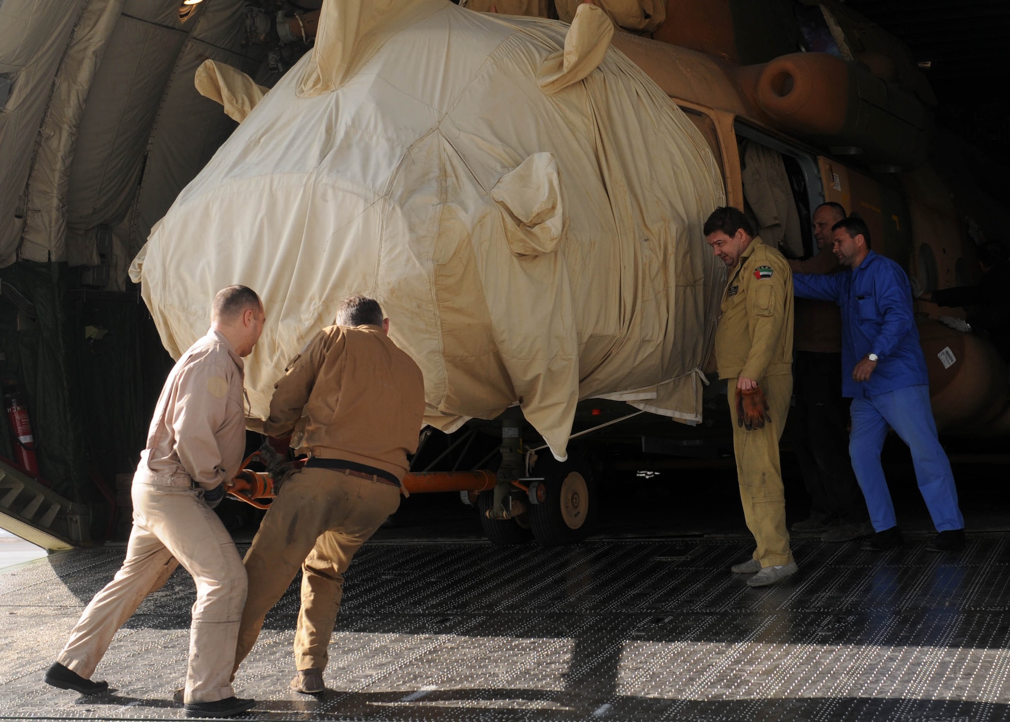 101210-N-6541W-001 KABUL, Afghanistan - The Afghan Air Force accepts delivery of four Mi-17s V5 helicopters at the air force base in Kabul  on Dec. 10.  (U.S. Navy photo by Mass Communication Specialist 2nd Class Vladimir Potapenko/ RELEASED).