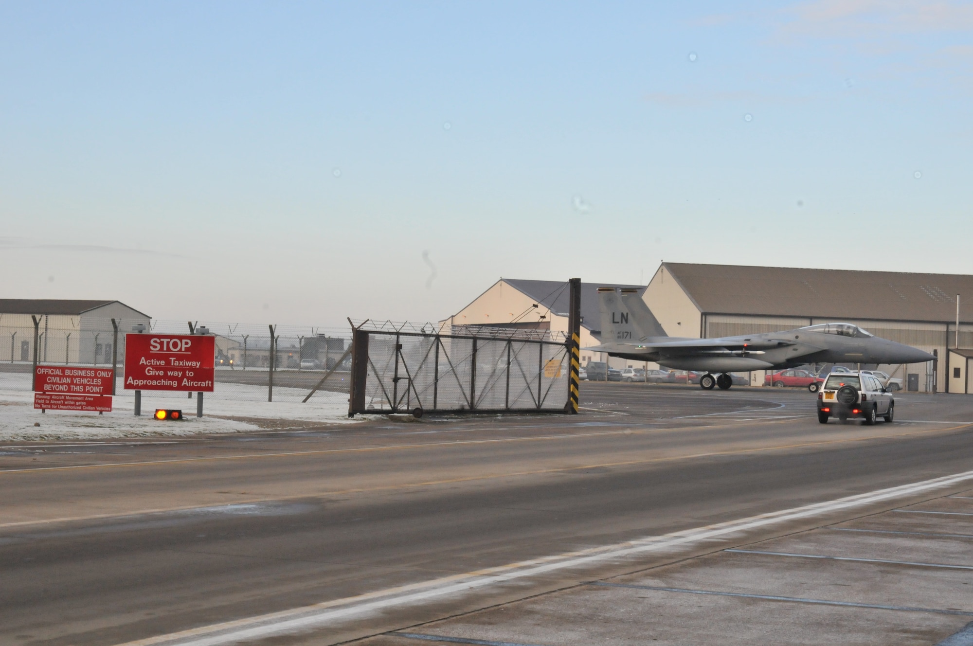 ROYAL AIR FORCE LAKENHEATH, England -- When crossing the taxiway, motorists must obey the stop sign and yield to approaching aircraft and vehicles traveling on the taxiway itself. Aircraft must be given a space of 300 feet front and rear before proceeding. (U.S. Air Force photo/Senior Airman David Dobrydney)