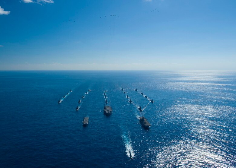 A formation of ships and aircraft from the U.S. military and Japan Self Defense Force cap the end of exercise Keen Sword, which took place Dec. 3-10. Identified as the largest joint, bilateral field training exercise between the two nations in Japan, Keen Sword 11 was designed to allow the two militaries to practice and evaluate the coordination procedures and interoperability elements required to effectively and mutually respond to the defense of Japan, or to a regional crisis or contingency situation in the Asia-Pacific region. (U.S. Navy photo)

