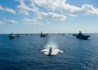 A formation of ships from the U.S. Navy and Japan Maritime Self Defense Force cruise in the Pacific Ocean at the conclusion of exercise Keen Sword, which took place Dec. 3-10. Identified as the largest joint, bilateral field training exercise between the two nations in Japan, Keen Sword 11 was designed to allow the two militaries to practice and evaluate the coordination procedures and interoperability elements required to effectively and mutually respond to the defense of Japan, or to a regional crisis or contingency situation in the Asia-Pacific region. (U.S. Navy photo)

