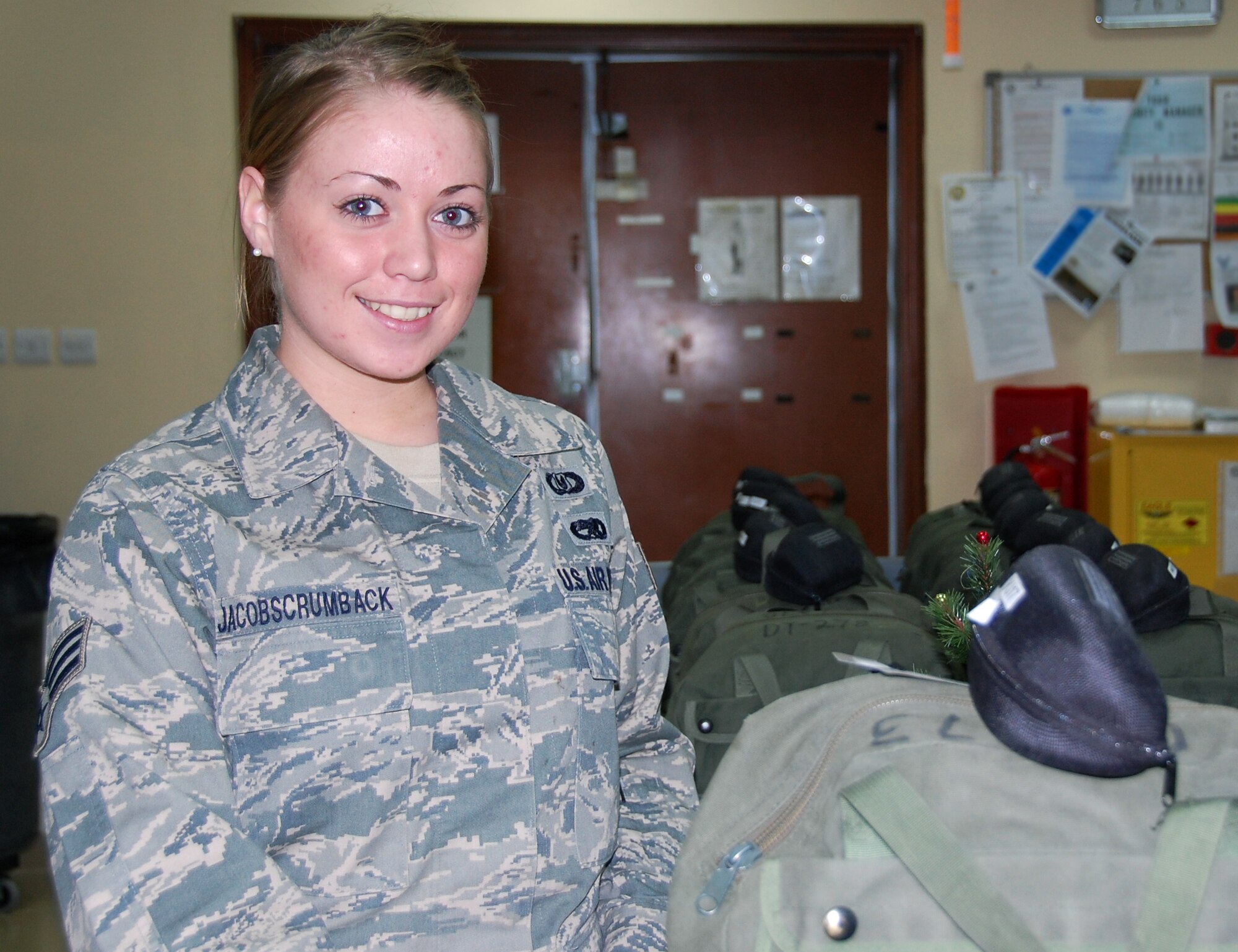 Senior Airman Ashley Jacobscrumback is deployed from the 374th Operations Support Squadron; Yokota Air Base, Japan.