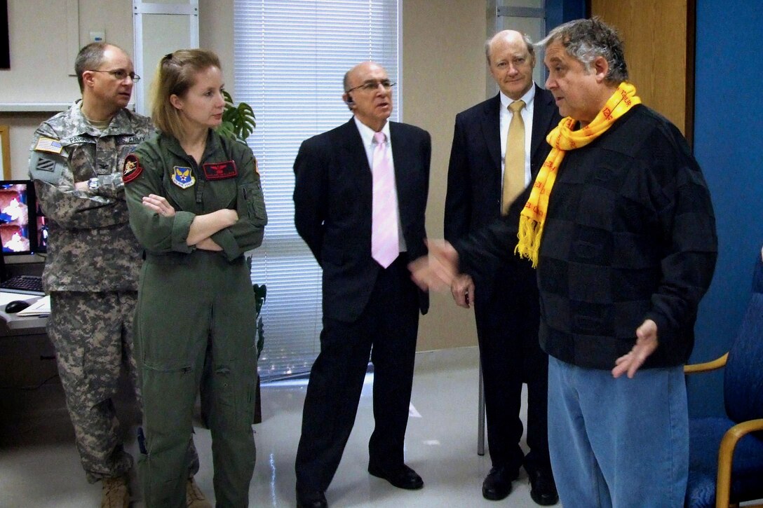 Dr. Richard Niemtzow and Dr. John Baxter and two military doctors from