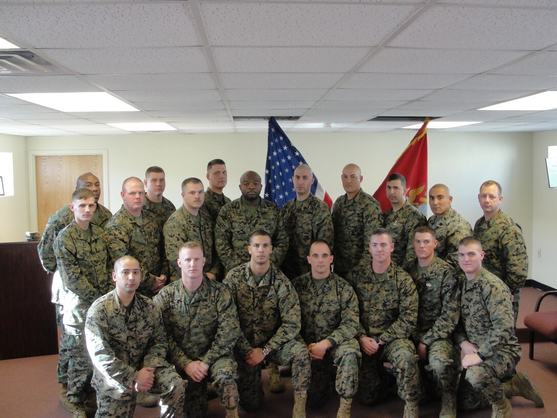 Marines pictured from left to right and front to back are Cpl Gonzalez, Sgt Lardie, Sgt Jensen, Sgt Brenza, SSgt White, Sgt Burks, Sgt Jasper, Sgt Martin, Sgt Henderson, SSgt Camp, CWO4 Diggs, SSgt Morris, GySgt Wessel, Capt Bowe, SSgt Sanchez, MGySgt Andrews, SSgt Dacres, Sgt Buckley, SSgt Perdue.