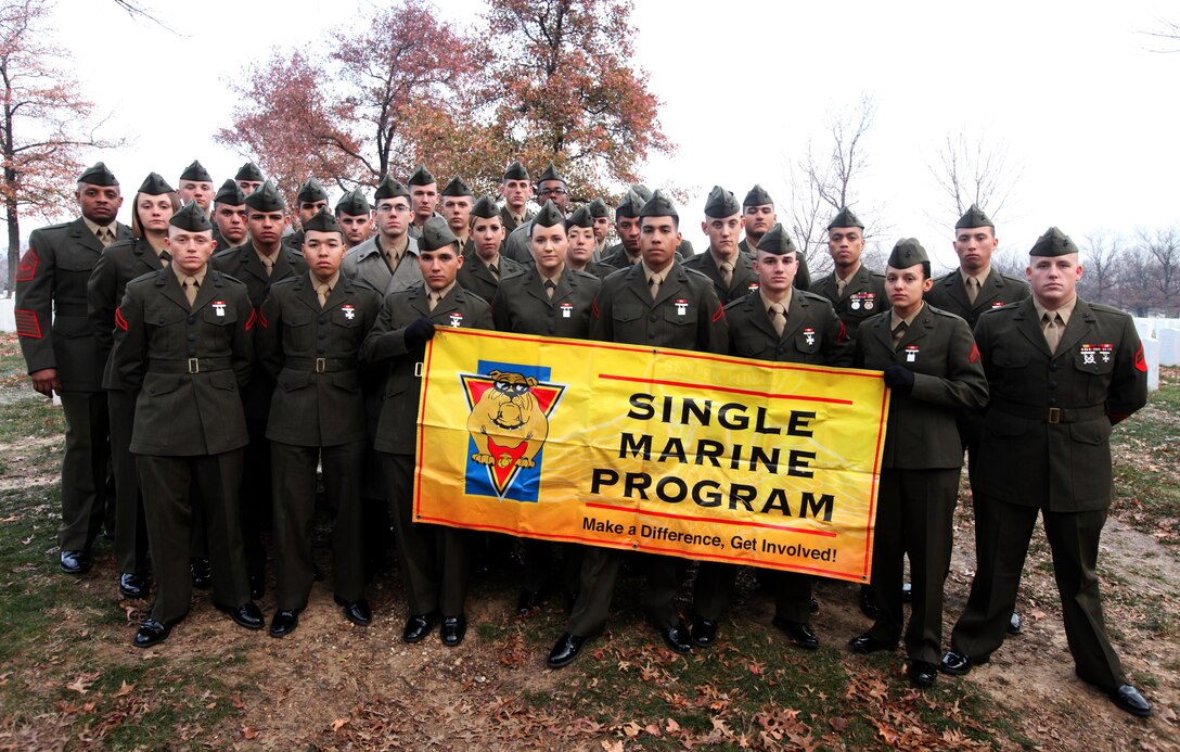 Marines with the Single Marine Program out of Marine Corps Base Camp Lejeune take a moment to pose for a photo at the Arlington National Cemetery before a wreath laying ceremony they participated in, Dec. 11. The SMP members helped thousands of other service members and families in attendance lay a total of 24,000 wreaths, ensuring that those who gave the ultimate sacrifice in times of war are not forgotten during the holidays.