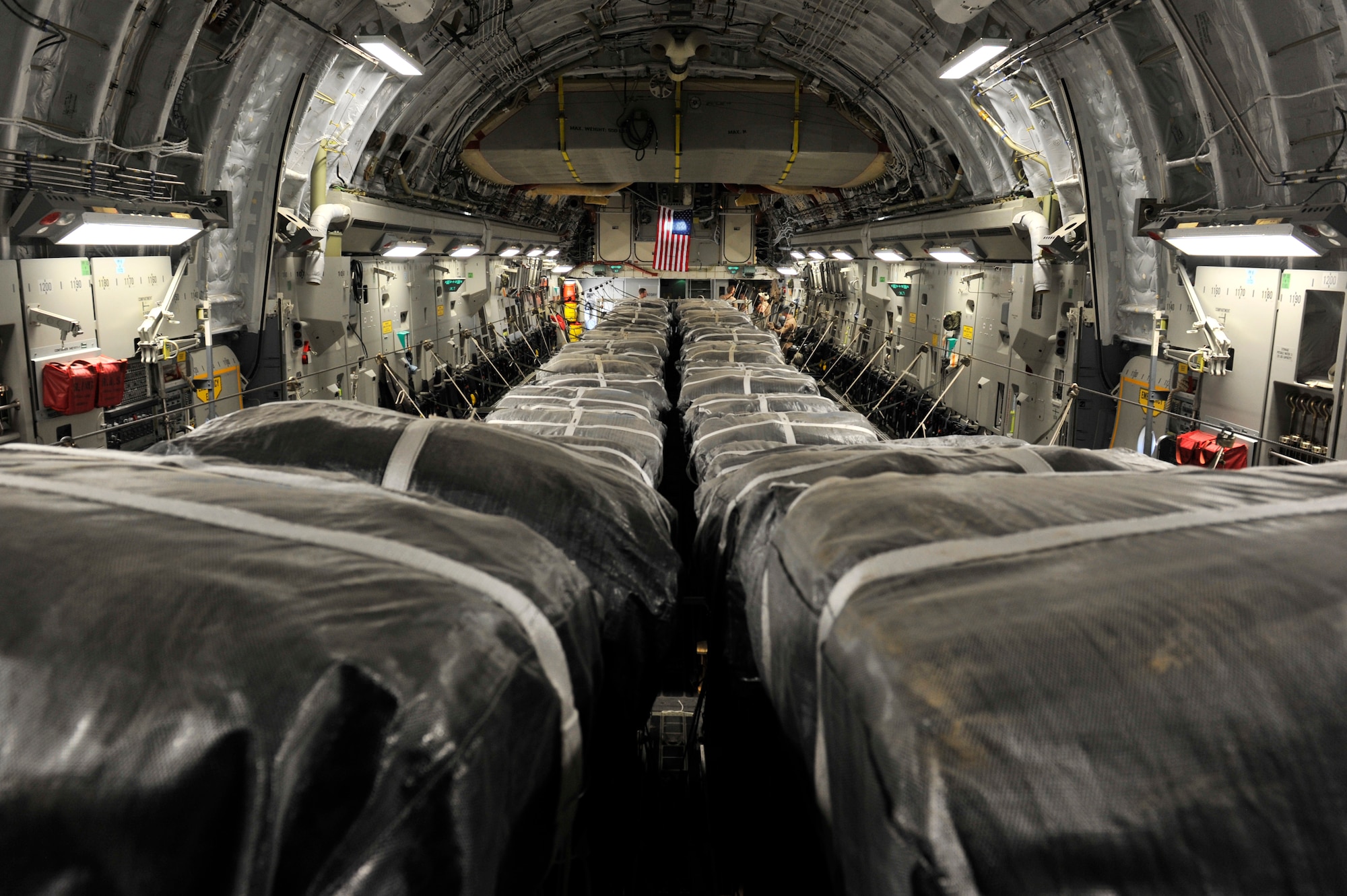 Bundles of fuel are loaded on a C-17 Globemaster III at Bagram Airfield, Afghanistan, for an airdrop, Dec. 10, 2010. The Globemaster fleet has surpassed 2 million flying hours since production began in 1993.  The airframe accumulated 1 million flying hours between 1993 and 2006. (U.S. Air Force photo/Staff Sgt. Christopher Boitz)