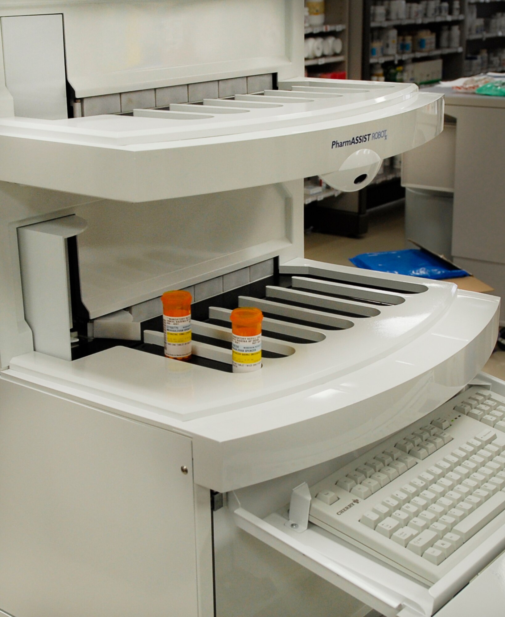 The PharmASSIST ROBOTx, which was recently added to the Kadena pharmacy, counts medications simultaniously and can fill a prescription every 15 seconds. The new pharmacy robot will reduce patient wait time and will allow technicians to focus on more aspects of their job. (U.S. Air Force photo/ Airman 1st Class Tara A. Williamson)
