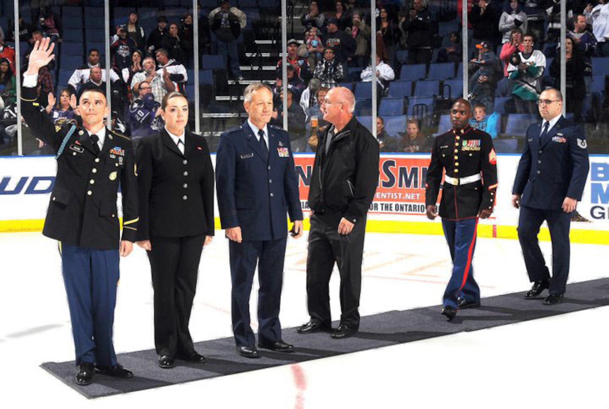 Servicemembers from March ARB attend an Ontario Reign hockey game as guests and color guard. (Photo courtesy of Ontario Reign)
