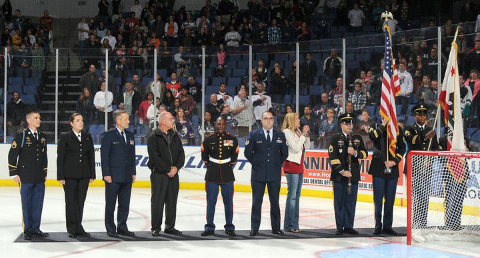 Servicemembers from March ARB attend an Ontario Reign hockey game as guests and color guard. (Photo courtesy of Ontario Reign)
