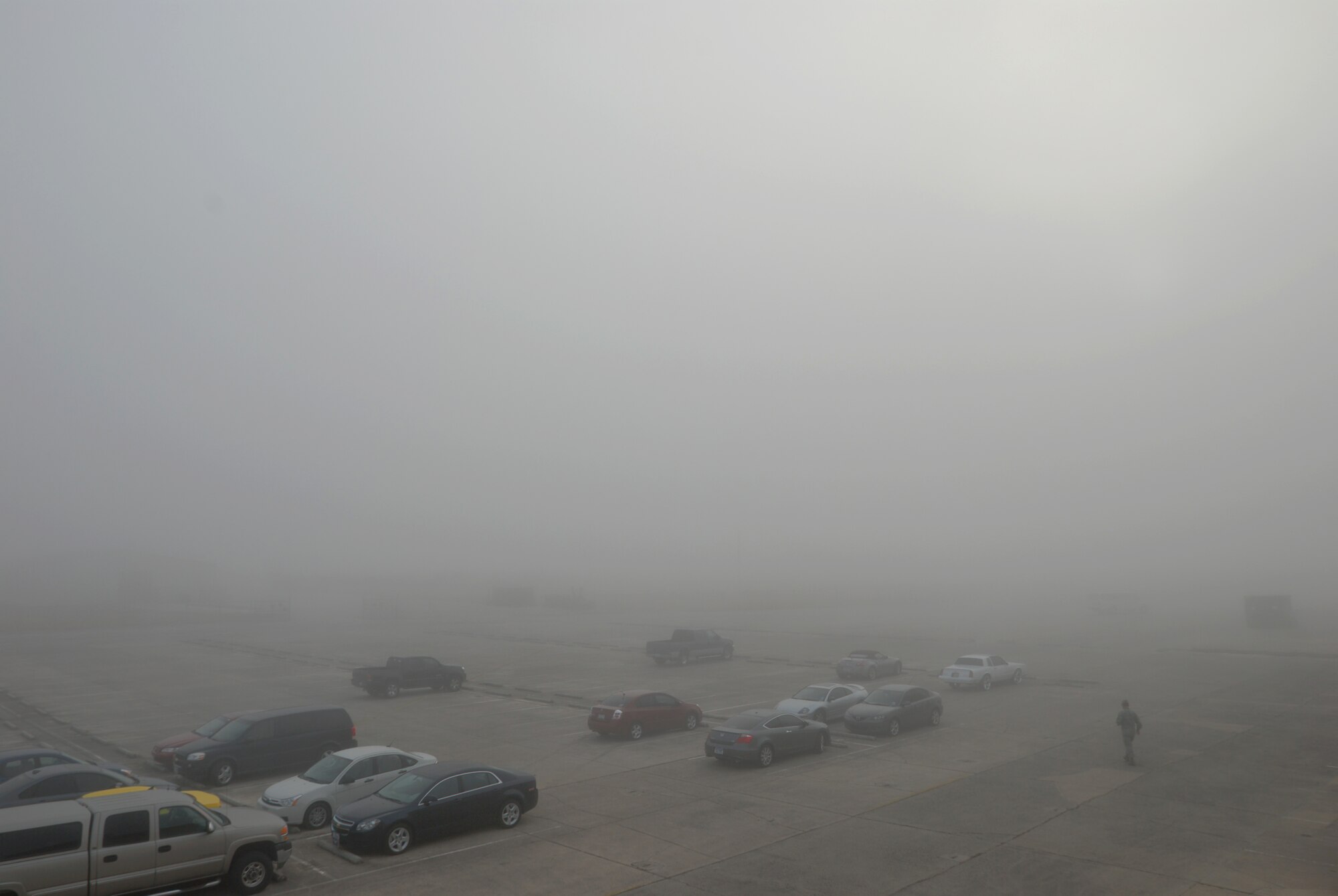 A thick blanket of winter morning fog obscures visibility of the flightline and and the giant C-5A Galaxy aircraft of the 433rd Airlift Wing, Lackland Air Force Base, Texas, Dec 11, 2010. (U.S. Air Force photo/Airman 1st Class Brian McGloin)