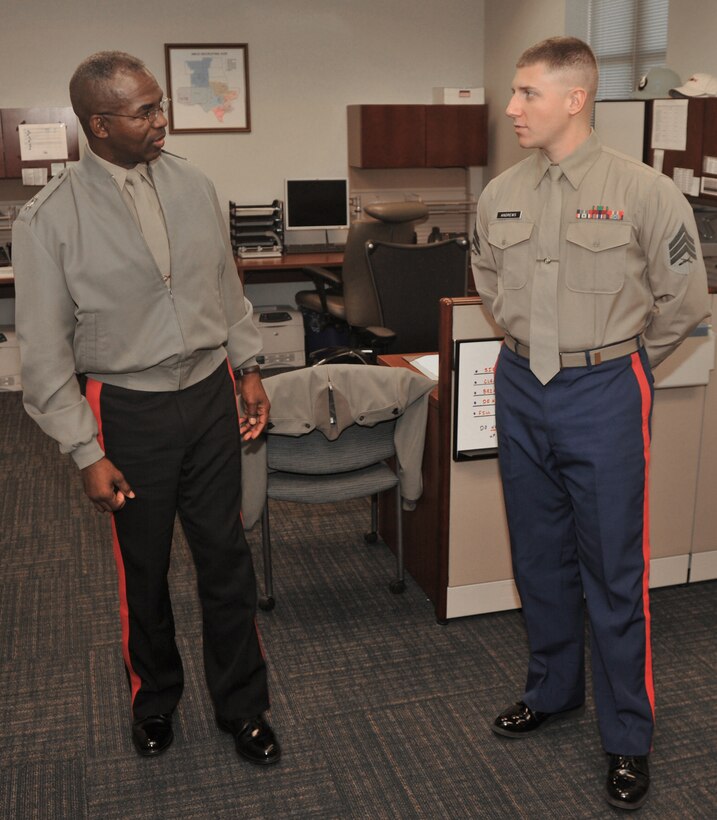 Maj. Gen. Ronald L. Bailey, commanding general of the Western Recruiting Region, speaks with Sgt. Dustin R. Andrews, 8th Marine Corps logistics clerk, during his visit to the district headquarters Dec. 13, 2010. Bailey spoke one-on-one with headquarters Marines before continuing his tour around the district's area of responsibilty.