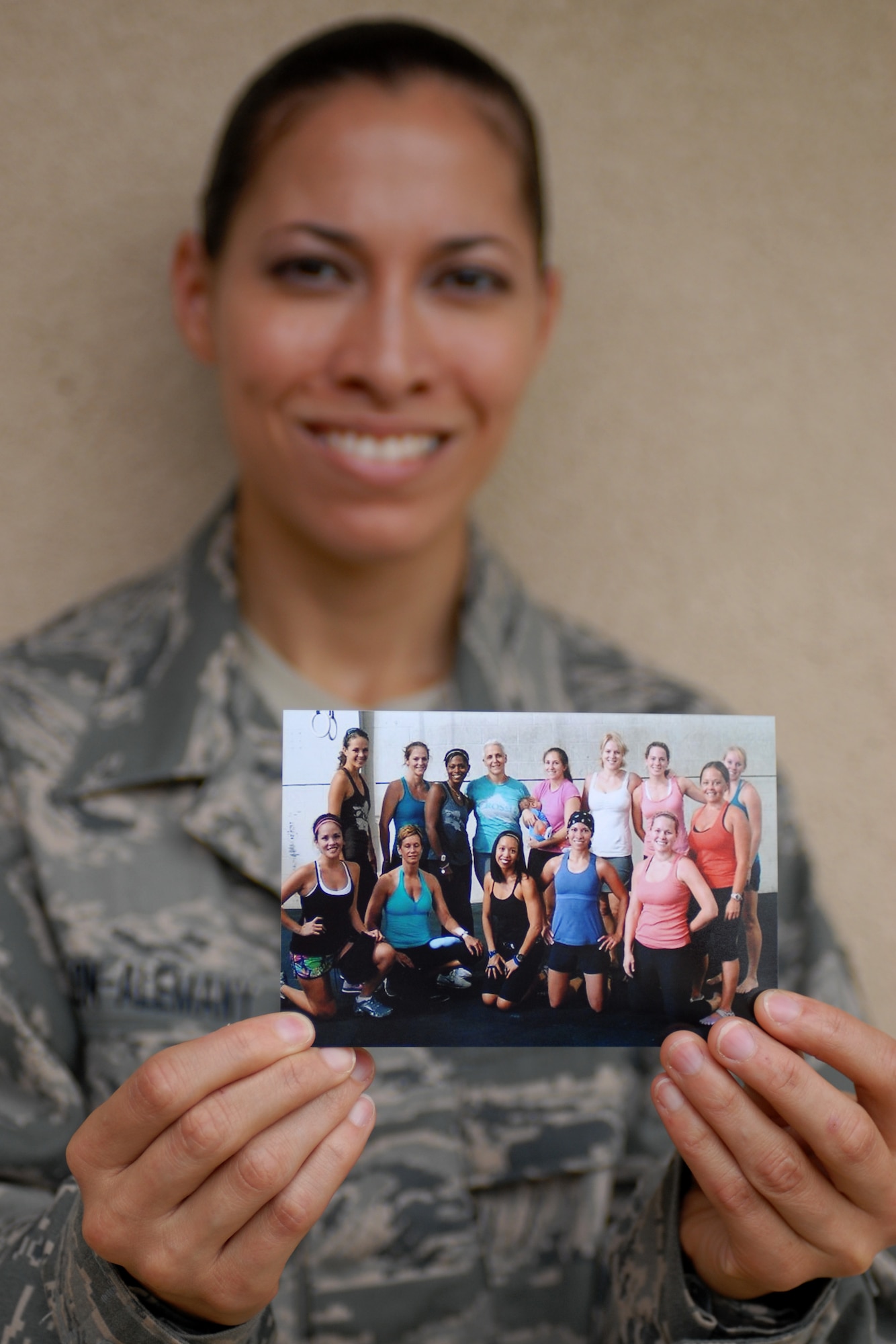 Tech. Sgt. Carmen Colon-Alemany's CrossFit Oahu "family" supported her during her second surgery and welcomed her back after just two months of recovery. It took Sergeant Colon more than a year to recover from her first surgery, before she began cross-training. (U.S. Air Force photo/Staff Sgt. Carolyn Viss)