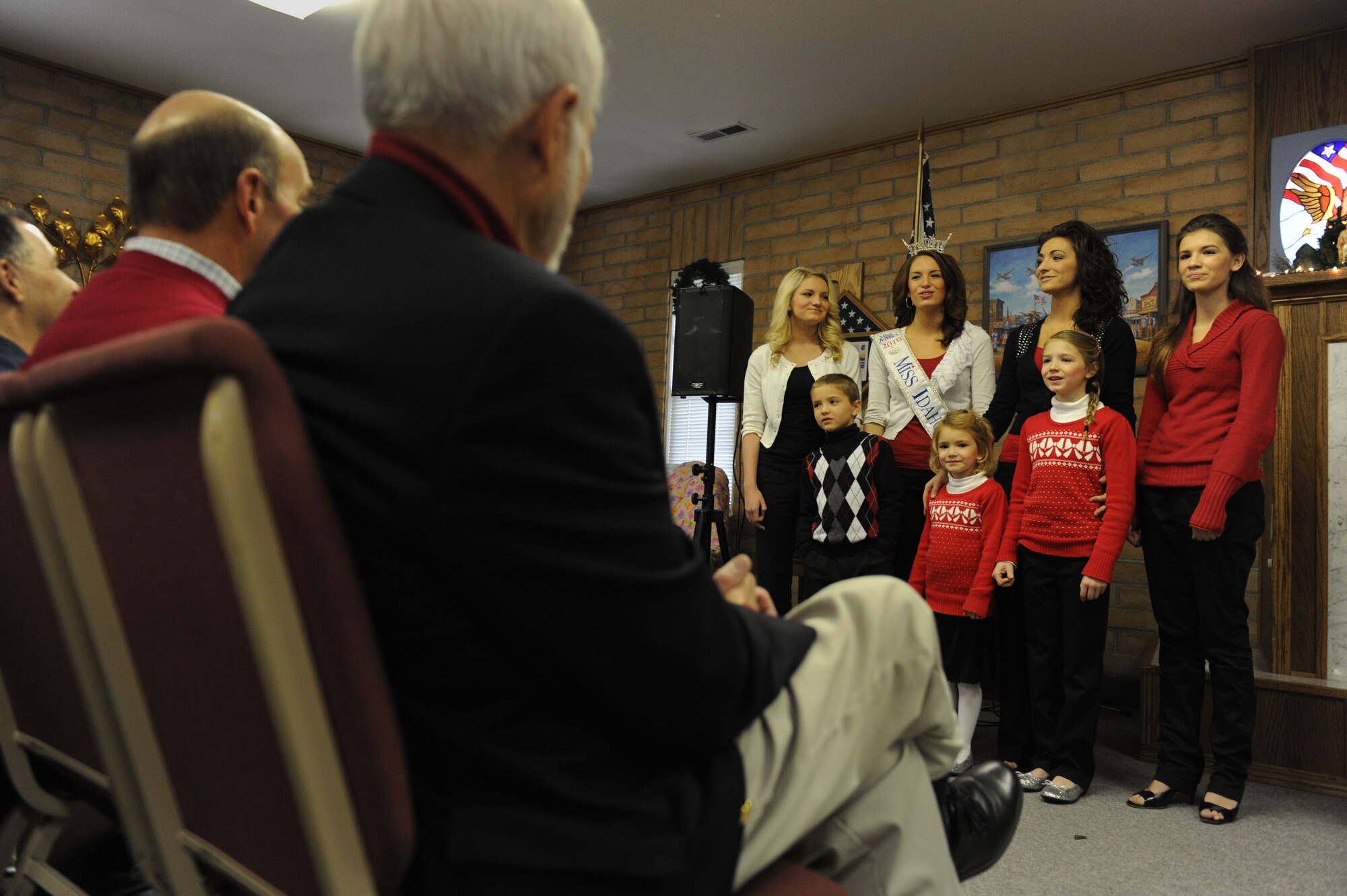 MOUNTAIN HOME AIR FORCE BASE, Idaho -- Members of the Kofoed family entertain the audience with holiday inspired music during the Silver Crest II Annual Holiday Social in Nampa, Idaho, Dec. 11. Every year hundreds of toys and quilts and more than a thousand pounds of food are donated to help military families during the holiday season. This year the community donated $17,000. (U.S. Air Force photo by Staff Sgt. Gina Chiaverotti-Paige)