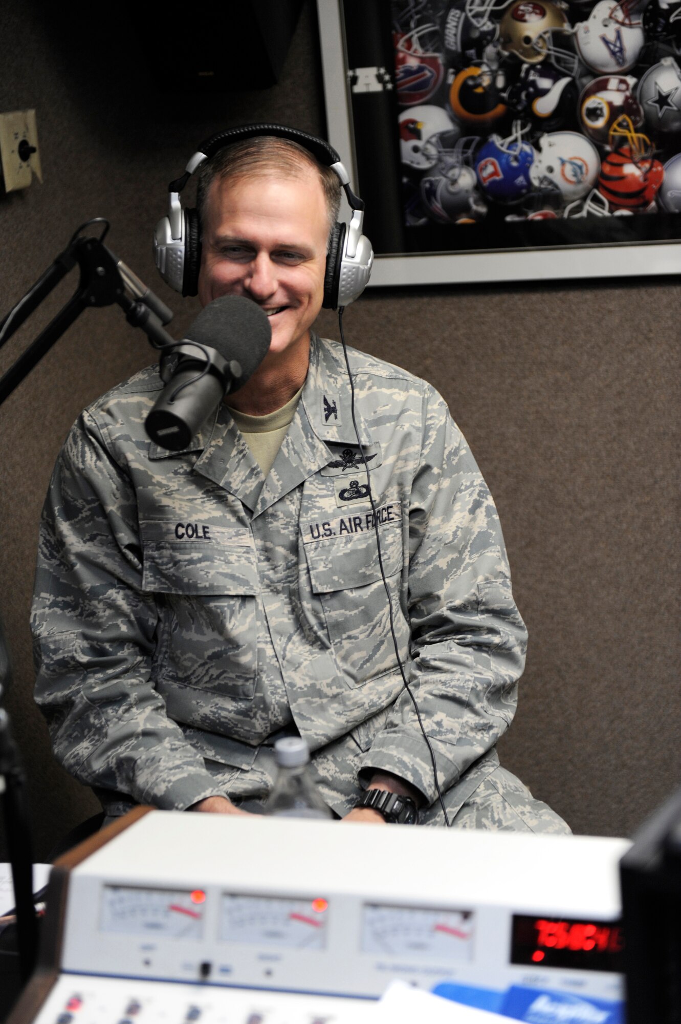 ALAMOGORDO, N.M. -- Col. Robert Cole, 49th Mission Support Group commander, is interviewed by Mike Mason, 94 KYEE radio personality, for the monthly Commander's Corner radio spot Dec. 3, 2010. Col. Cole talked about the mission at Holloman Air Force base, directly answered questions from callers and personally mentioned a certain Airman who went above and beyond their normal day to day duties. To hear the next Commander's Corner, tune into 94 KYEE on the first Friday of every month, from 7 to 9 a.m. (U.S. Air Force photo by Airman 1st Class Eileen Payne/Released)