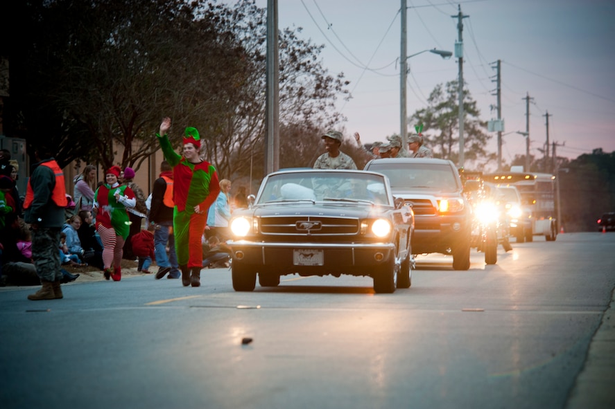 MOODY AIR BASE, Ga. -- Members of base leadership begin the Annual Base Tree Lighting and Holiday Parade Dec. 10. The parade also featured appearances by the 23rd Civil Engineer Squadron fire department, motorcycle club members, the Grinch, Santa Claus and many more. (U.S. Air Force photo/Senior Airman Jamal D. Sutter)(RELEASED) 
