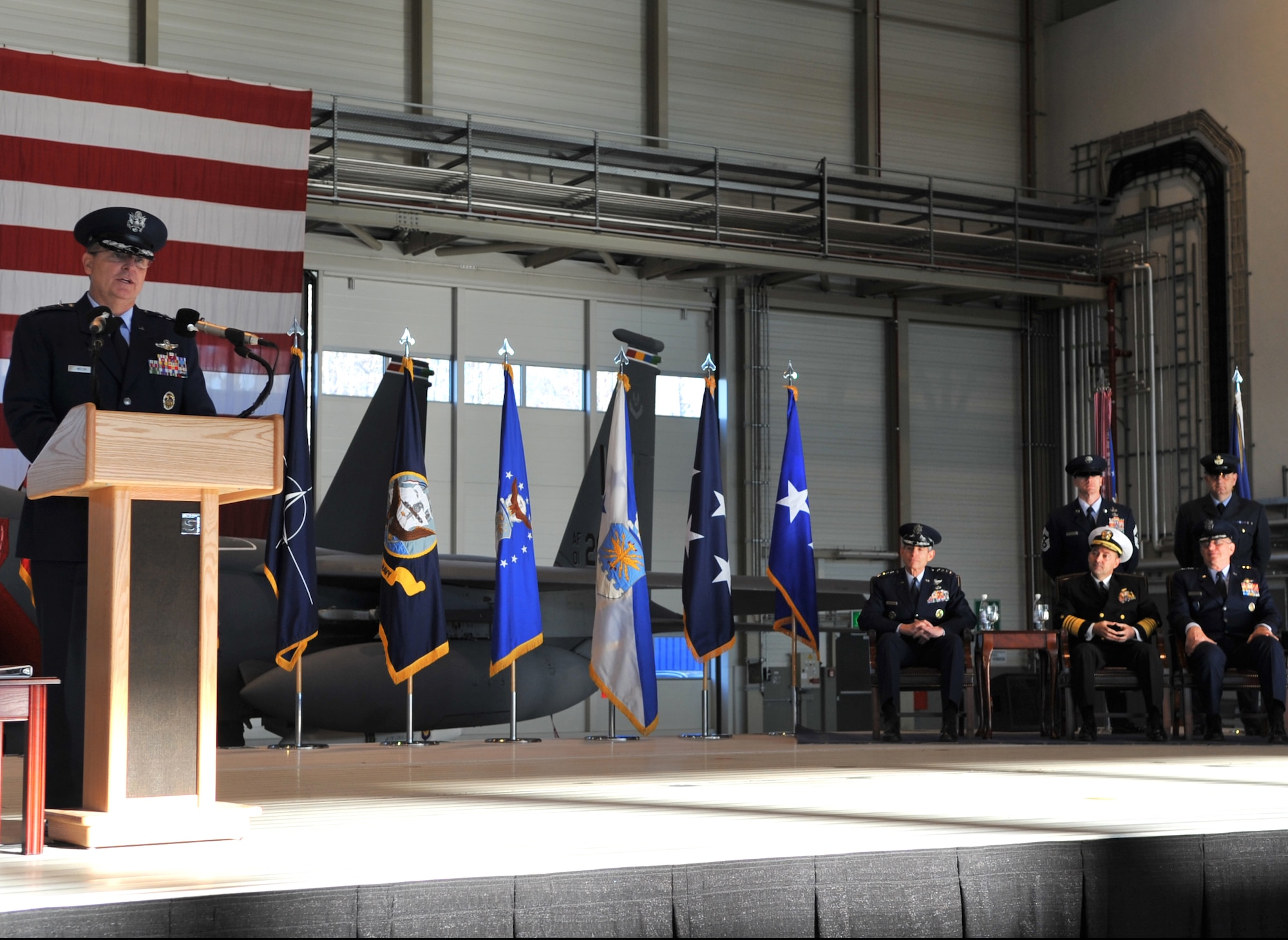 Gen. Mark A. Welsh III speaks to those in attendance after accepting command of U.S. Air Forces in Europe during a change of command ceremony Dec. 13, 2010, at Ramstein Air Base, Germany.  Gen. Roger A. Brady relinquished command of USAFE during the ceremony after providing command and control for air, space and missile defense for activities in an area of operations covering almost one-fifth of the globe which included 51 countries in Europe, Asia, the Middle East, and the Arctic and Atlantic oceans. (U.S. Air Force photo/Senior Airman Caleb Pierce)