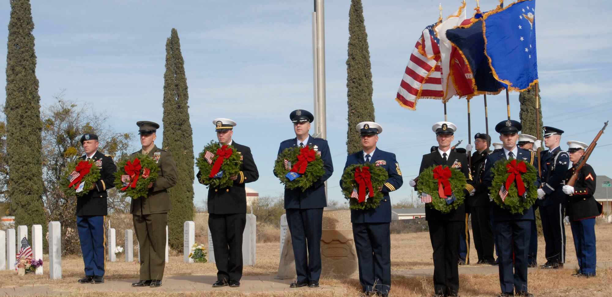 SAN ANGELO, Texas – Commanders representing all the Services on Goodfellow and the Angelo State University Air Force ROTC Detachment as well as the base’s Joint Service Color Guard participate in the National Wreaths Across America Ceremony at the Belvedere Cemetery in San Angelo Dec. 11.  Wreaths Across America was formed in 2007 to promote veterans remembrance.  Wreaths are placed on veterans graves during the holiday season.  (U.S. Air Force photo/Kent Cummins)