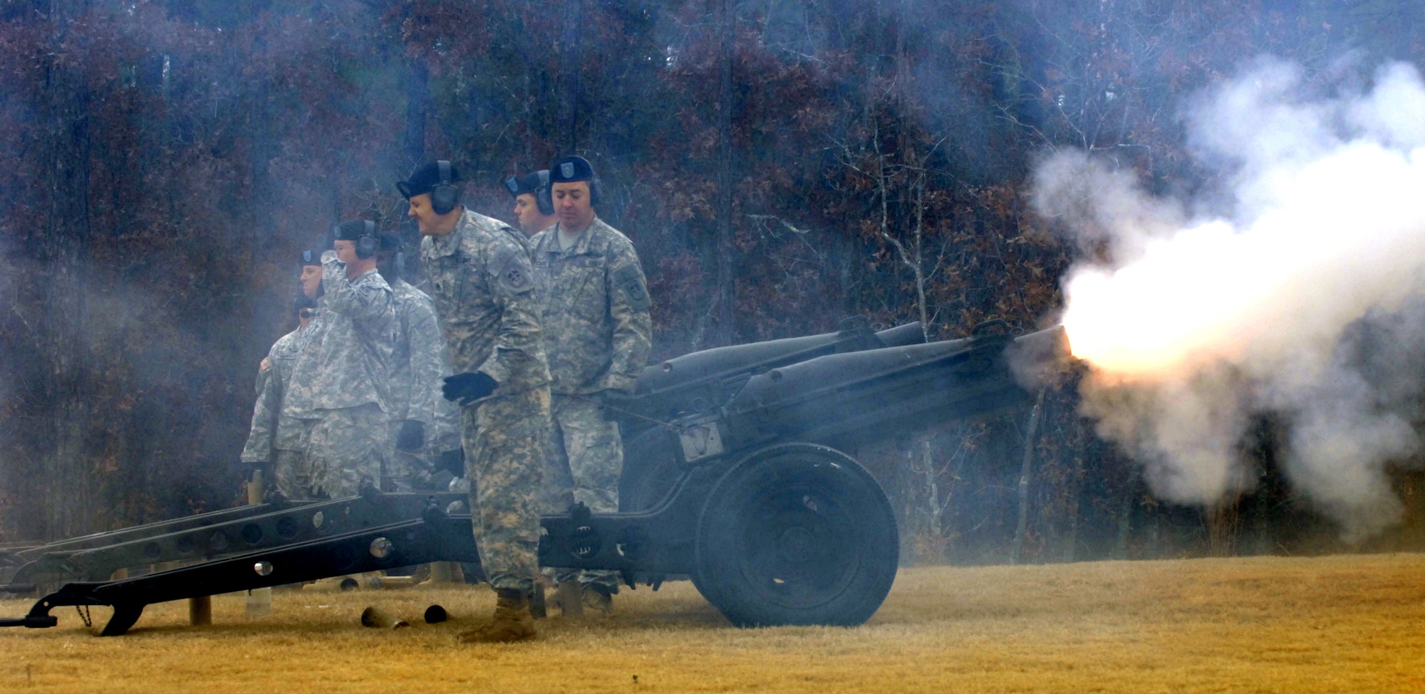 COLUMBIA, S.C. (Dec. 11, 2010) - Soldiers from Bravo Company, 4th Battalion, 10th Infantry Regiment from Fort Jackson, S.C. fire off a cannon for a 21-gun salute during the Wreaths Across America ceremony at Fort Jackon National Cemetery, Dec. 11. The ceremony was held to remember our veterans who have passed, honor those who are serving and have served and teach our children what it means to serve our country. The ceremony included a memorial presentation, World War II wreath laying, recognition of prisoners of war, those still missing in action and Merchant Marines, a 21-gun salute by a cannon battery and buglers.

