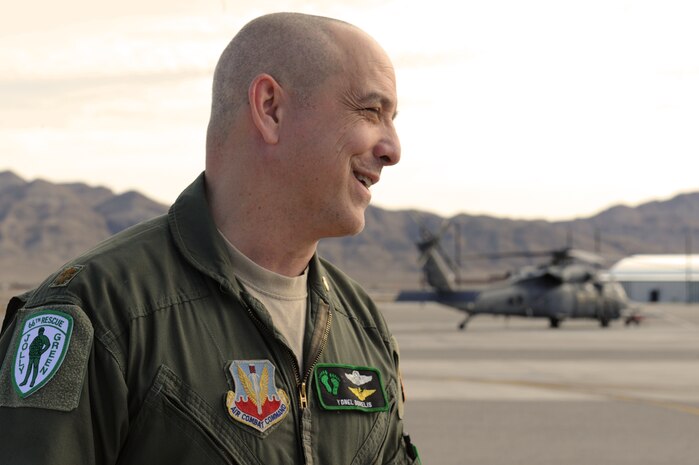 NELLIS AIR FORCE BASE, Nev.-- Maj. Yonel "Yogi" Dorelis reflects on his experiences after his retirement ceremony Dec. 10. Major Dorelis retired after a helicopter flying career spanning 28 years in which he was part of all four U.S. military branches. (U.S. Air Force photo by 2nd Lt. Ken Lustig)