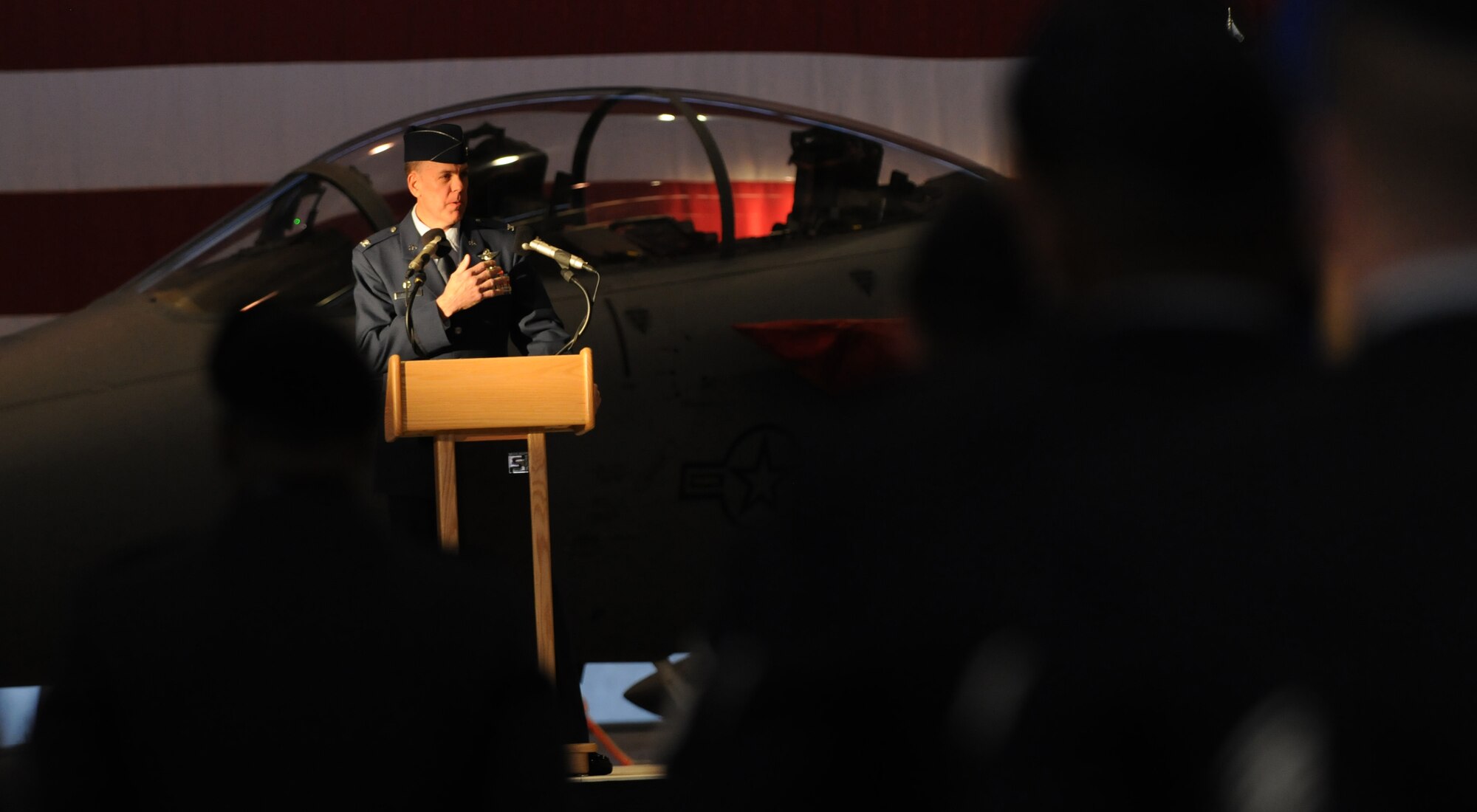 U.S. Air Force Col. John Shapland, 435th Air Ground Operations Wing commander, addresses the crowd after assuming command of the wing during the 435th AGOW Change of Command ceremony held on Ramstein Air Base, Germany, Dec. 13, 2010. (U.S. Air Force photo by Staff Sgt. Nathan Lipscomb)