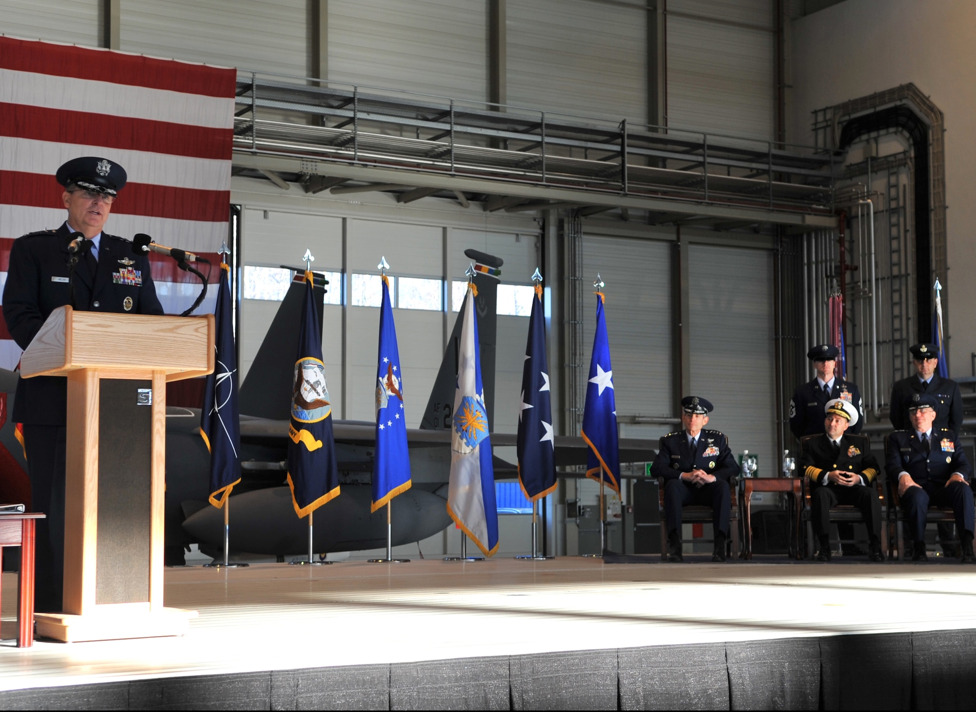 U.S. Air Force Gen. Mark A. Welsh III, speaks to the those in attendance after accepting the command of U.S. Air Forces in Europe during a change of command ceremony, Ramstein Air Base, Germany, Dec. 13, 2010. Gen. Roger A. Brady, relinquished command of USAFE during the change of command ceremony after providing command and control for air, space and missile defense for activities in an area of operations covering almost one-fifth of the globe which included 51 countries in Europe, Asia, the Middle East, and the Arctic and Atlantic oceans. (U.S. Air Force photo by Senior Airman Caleb Pierce)