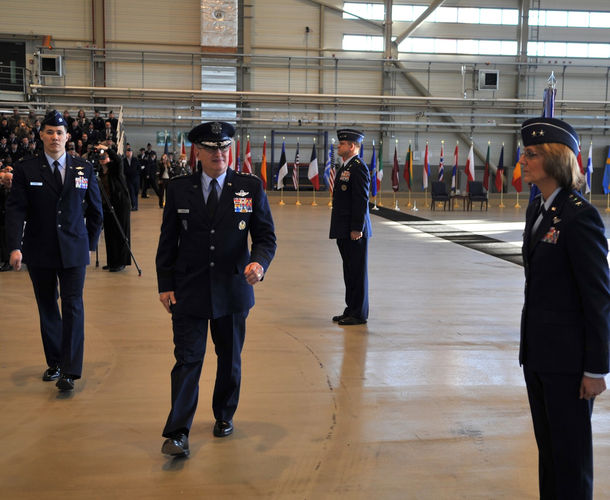 U.S. Air Force Gen. Roger A. Brady, outgoing U.S. Air Forces in Europe commander, gives a last inspection to his Airmen during a change of command ceremony, Ramstein Air Base, Germany, Dec. 13, 2010. Gen. Brady, outgoing USAFE commander, relinquished command during the change of command ceremony after providing command and control for air, space and missile defense for activities in an area of operations covering almost one-fifth of the globe which included 51 countries in Europe, Asia, the Middle East, and the Arctic and Atlantic oceans. (U.S. Air Force photo by Senior Airman Caleb Pierce)