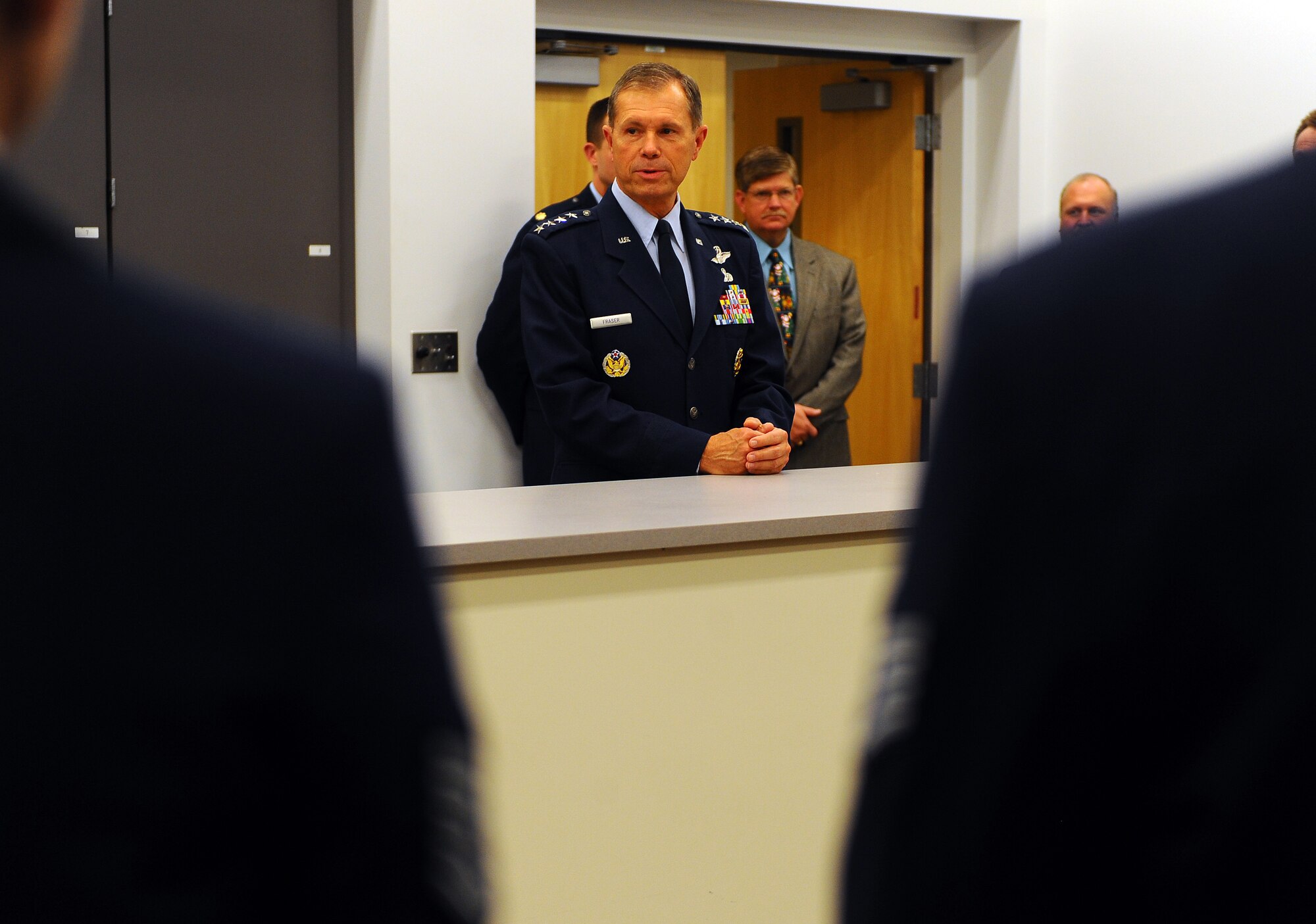 OFFUTT AIR FORCE BASE, Neb. ? Gen.William M. Fraser III, Air Combat Command commander, greets members of the Heartland of America Band following their annual holiday concert held at the Holland Performing Arts Center in downtown Omaha, Dec. 9. U.S. Air Force Photo by Josh Plueger (Released)