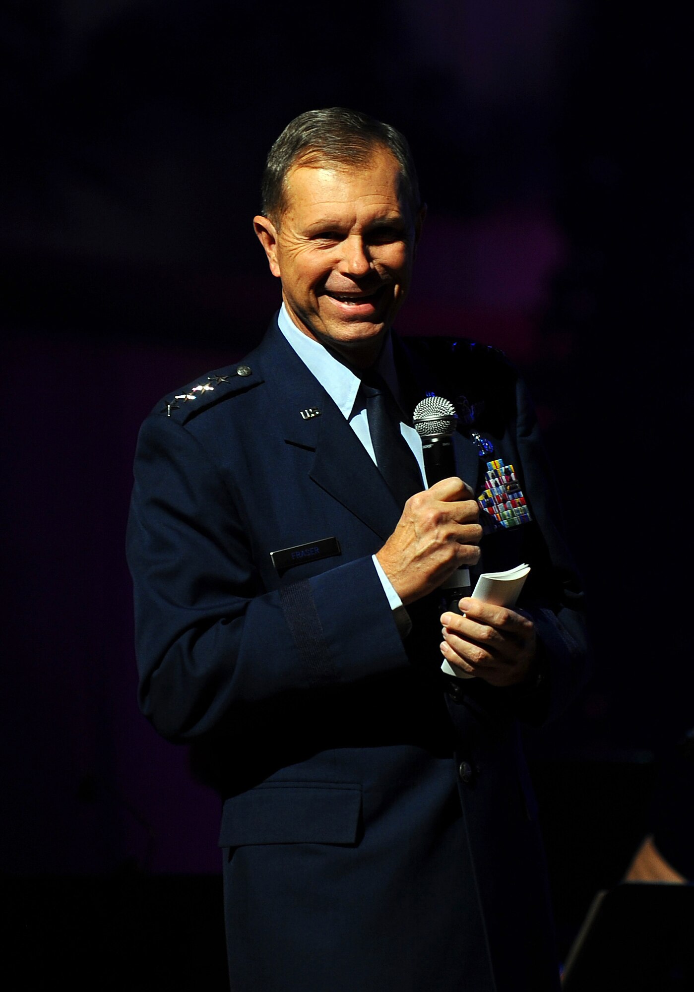 OFFUTT AIR FORCE BASE, Neb. ? Gen. William M. Fraser III, Air Combat Command commander, provides opening remarks to concert goers at the Heartland of America Band?s annual holiday concert held at the Holland Performing Arts Center in downtown Omaha, Dec. 9. General Fraser visited Offutt as part of a tour of ACC assets in the United States. U.S. Air Force Photo by Josh Plueger (Released)