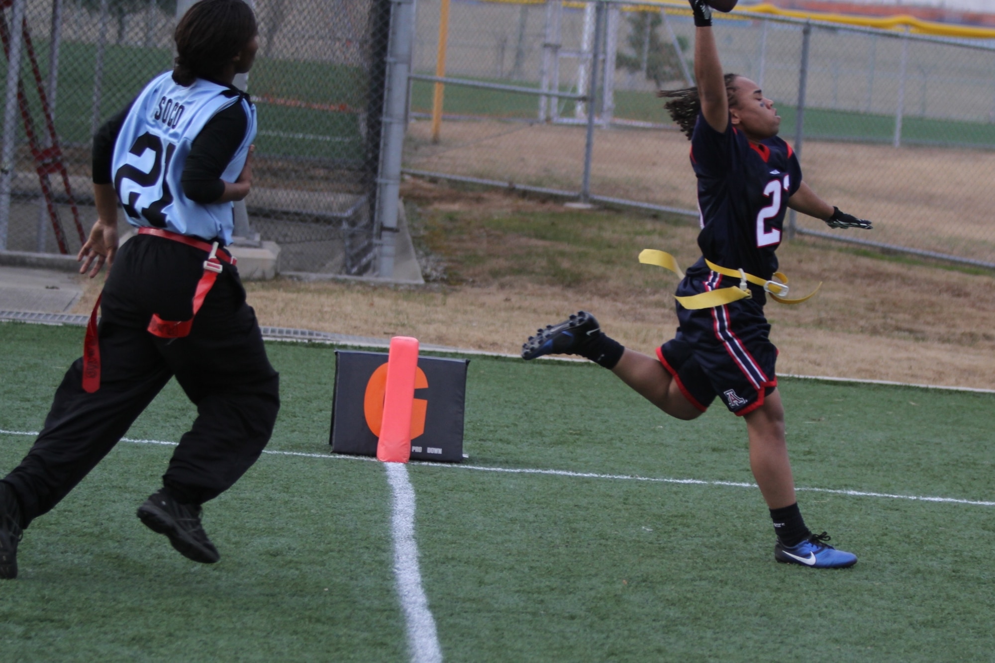 Lauryn McCoy scores a touchdown in the championship game against Camp Humphreys II Dec. 5. (Courtesy photo)