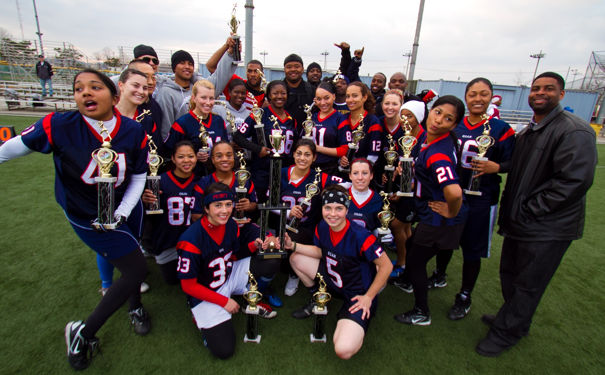 The 2010 Osan Lady Mustangs (from left to right): Top row - DeLourdes Crawley, Mairy-Ann Paloukos, Alfredo Catolico, Chantal Jennings, Tina Meyers, Candara Tillman, Eric Long, Vanessa Valente-Perryman, Courtney McBurney, Aimee Roth, Jazelle Mason, Kimberly Lewis, Tia Thomas. Middle row - Brenda Khamthongath, Lauryn McCoy, Erica Burris, Natacia Flick. Bottom row - Samantha Perry and Alexandria Ketterhagen. Not pictured - Raquel Marshall, Melesha Witter. (Courtesy photo)