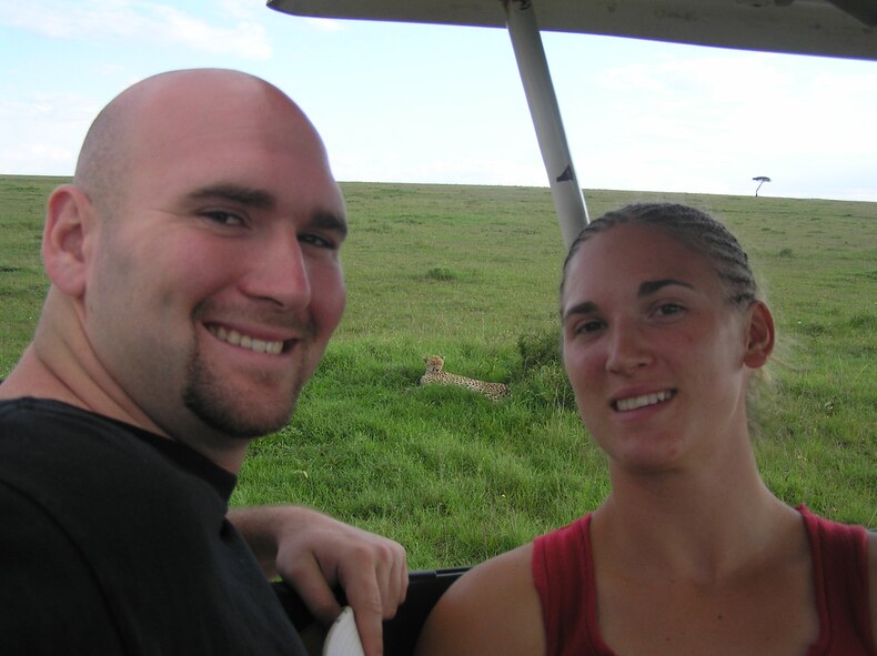 AEDC 2nd Lt. Wes Meredith poses in front of a cheetah with his sister, Emily, during a visit to Masai Mara park in Kenya. Lieutenant Meredith grew up in Kenya and hopes to return there someday. To help his chances of going back, he is taking Swahili courses through the Air Force LEAP program. (Photo submitted) 