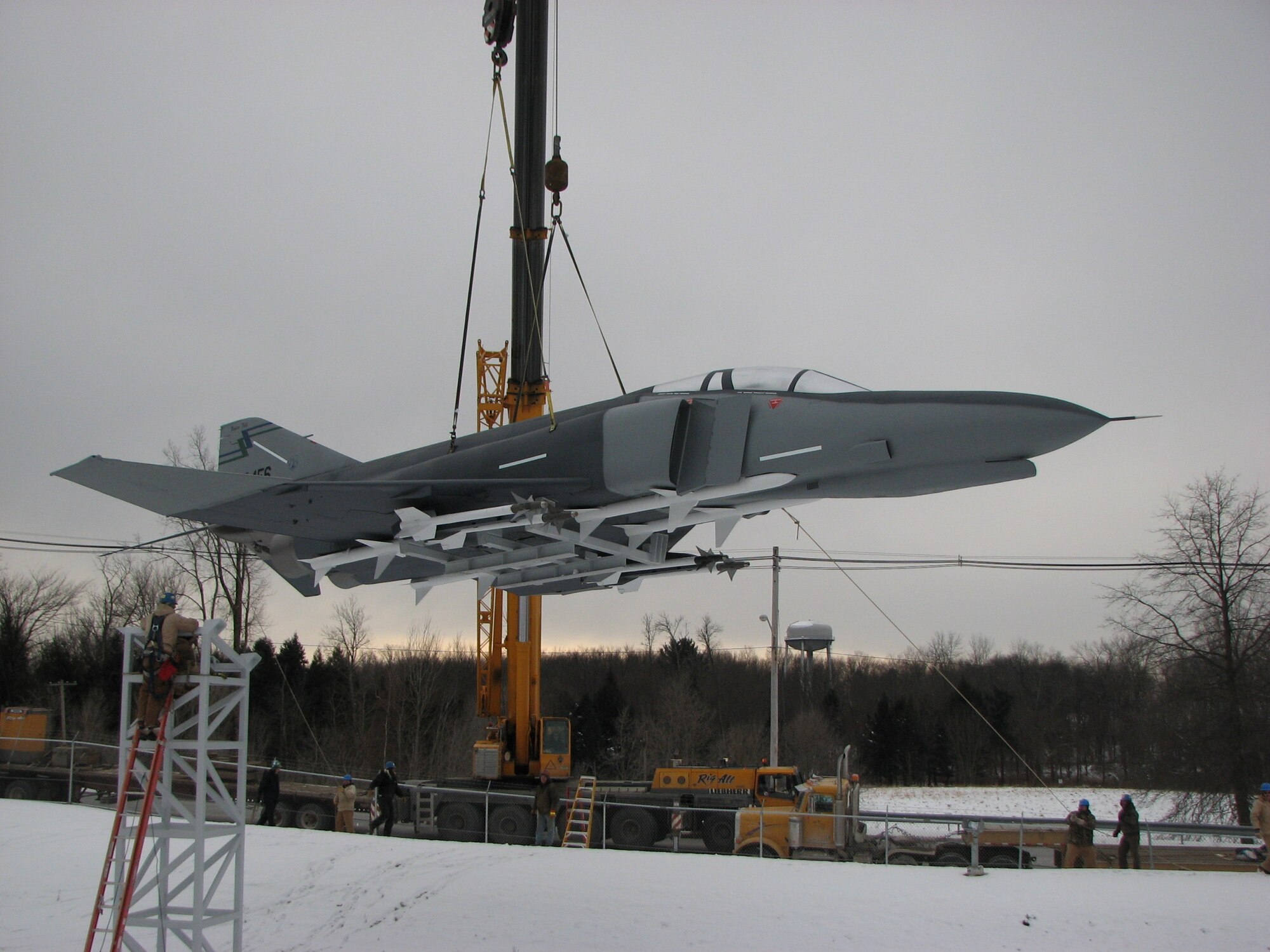 Workers craned a restored F-4 Phantom II jet onto its pedestal Friday afternoon at the Eastern Air Defense Sector in Rome, N.Y. One of the most renowned combat planes in the Air Force inventory, the F-4 was used extensively in Vietnam and saw service in Desert Storm before being retired in 1996. 