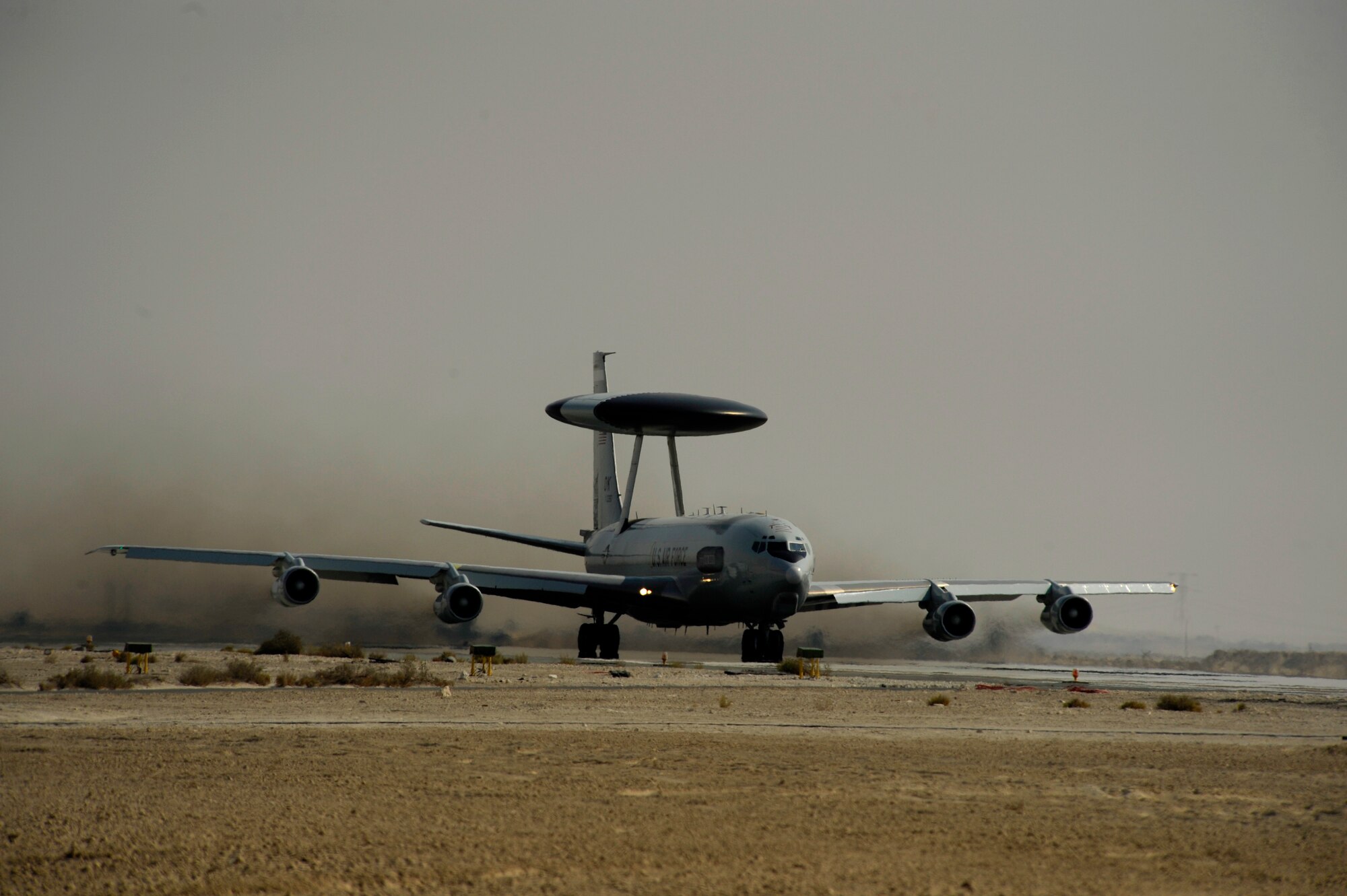 A U.S. Air Force E-3 Sentry from the 964th Expeditionary Airborne Air Control Squadron takes off from an undisclosed location in Southwest Asia, Nov. 23, 2010.  The E-3 is an Airborne Warning and Control System (AWACS) that provides all-weather surveillance, command, control and communications.  (U.S. Air Force Photo/Staff Sgt. Eric Harris) (RELEASED)