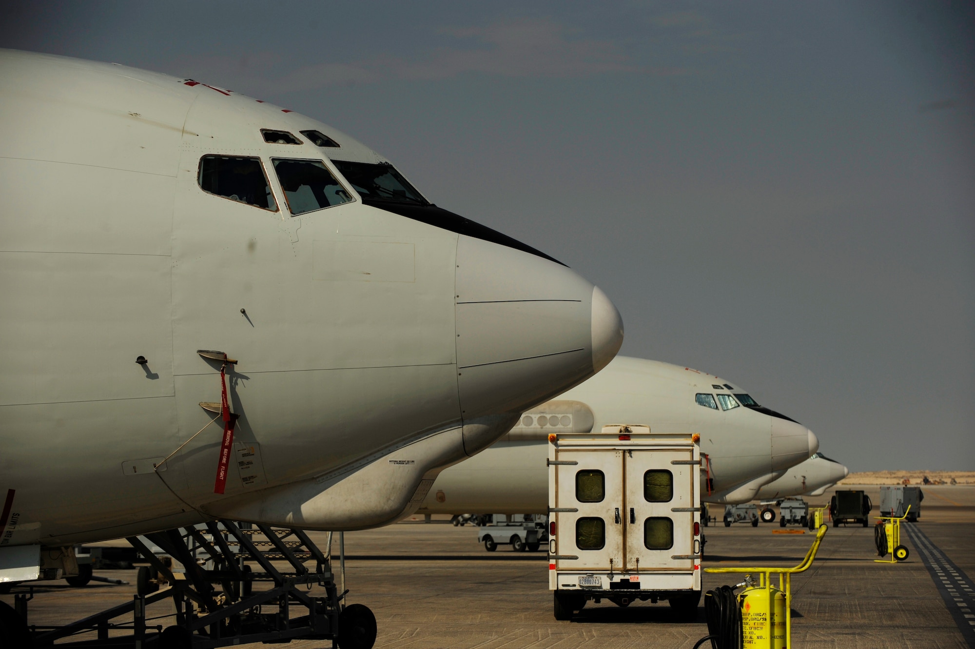 U.S. Air Force E-3 Sentrys sit on the parking ramp at an undisclosed location in Southwest Asia, Nov. 23, 2010.  The E-3 is an Airborne Warning and Control System (AWACS) that provides all-weather surveillance, command, control and communications.  The maintainers are deployed from Tinker Air Force Base, Okla.  (U.S. Air Force Photo/Staff Sgt. Eric Harris) (RELEASED)