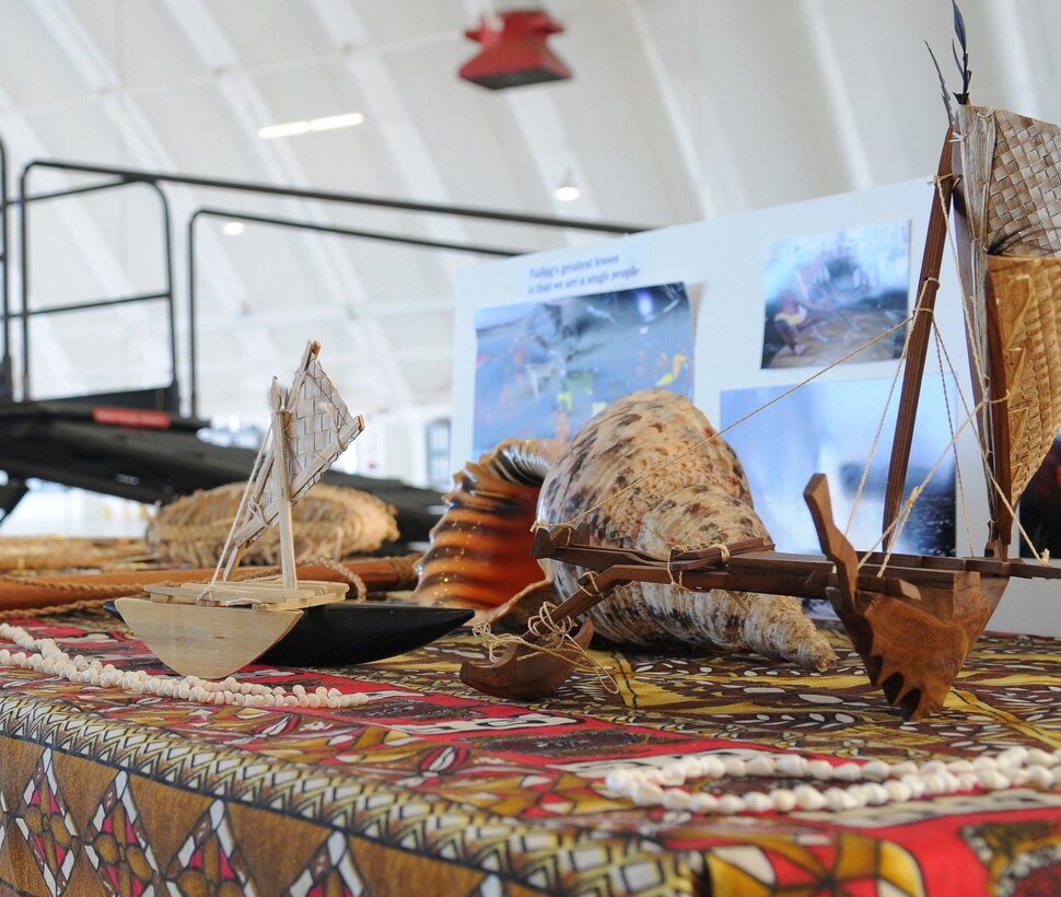 Items received from Micronesian Islanders adorn the presentation table during the Operation Christmas Drop Push Ceremony at Andersen Air Force Base, Guam, Dec. 13. At the conclusion of the ceremony handcrafted items were given as gifts from the Islanders to the 36th Wing and the 374th Airlift Wing for their continued support in the annual humanitarian airlift operation. Airmen from the 36th Wing and the 374th Airlift Squadron come together each year to drop thousands of pounds of donated supplies over the Micronesian Islands. To date, more than 800,000 pounds of supplies have been dropped. (U.S. Air Force photo/ Senior Airman Nichelle Anderson)