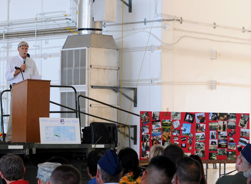Mr. Bruce Best, University of Guam researcher, addresses the audience during the Operation Christmas Drop Push Ceremony at Andersen Air Force Base, Guam, Dec. 13. This researcher has been an essential part of Operation Christmas Drop for several years, communicating and coordinating with C-130 crews and key personnel in the islands where the drops are needed. What started as a WB-50 aircrew returning to Guam on its final flight before Christmas, has turned into the longest running humanitarian campaign in the history of the U.S. Air Force and the entire world. (U.S. Air Force photo Senior Airman Nichelle Anderson)