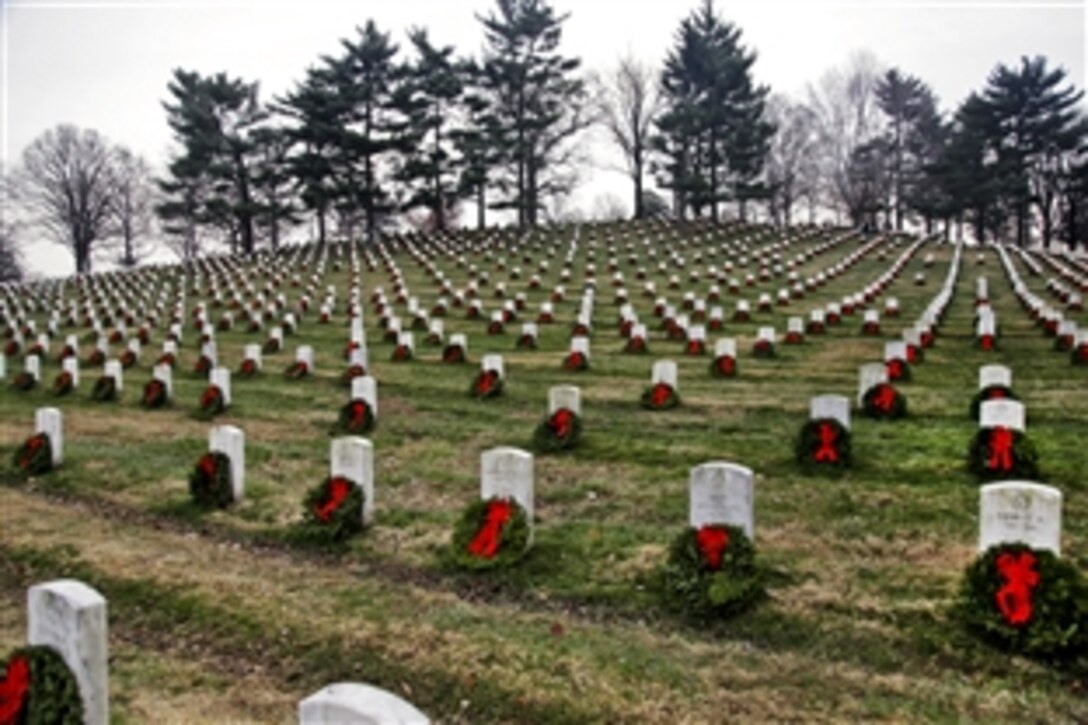 More than 7,000 volunteers placed 24,000 wreaths on the headstones of fallen troops during an annual event known as Wreaths Across America in Arlington National Cemetery, Va., Dec. 11, 2010.