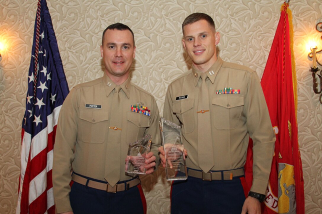 Captain Joseph Petkus(right), the 2010 officer selection officer of the year, stands next to Capt. Jeffrey Potter, the officer selection officer of the year runner up. Both Marines exceeded their set missions for the year.