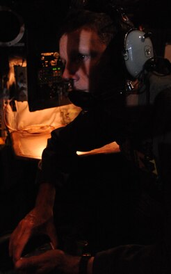 Col. Jeff Morgan, 15th Operations Group commander, observes aircrew members of the 96th Air Refueling Squadron's first operational flight as they prepare for takeoff Dec. 14 at Joint Base Pearl Harbor-Hickam, Hawaii. During the mission, a 96th ARS KC-135 Stratotanker joined a KC-135 from the Iowa Air National Guard as part of a two-ship formation to refuel two B-52 Stratofortresses on the way to Guam. (U.S. Air Force photo/Staff Sgt. Nathan Allen)