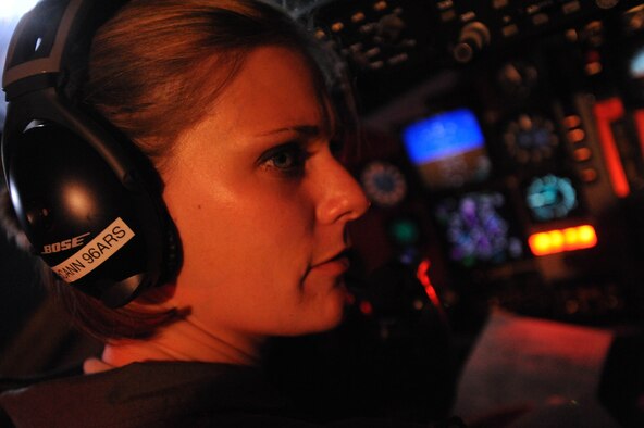 Capt. Jasmine McCann, 96th Air Refueling Squadron pilot, teamed with other 96th ARS aircrew members to conduct the squadron's first operational mission Dec. 14 at Joint Base Pearl Harbor-Hickam, Hawaii. During the mission, a 96th ARS KC-135 Stratotanker joined a KC-135 from the Iowa Air National Guard as part of a two-ship formation to refuel two B-52 Stratofortresses on the way to Guam. (U.S. Air Force photo/Staff Sgt. Nathan Allen)
