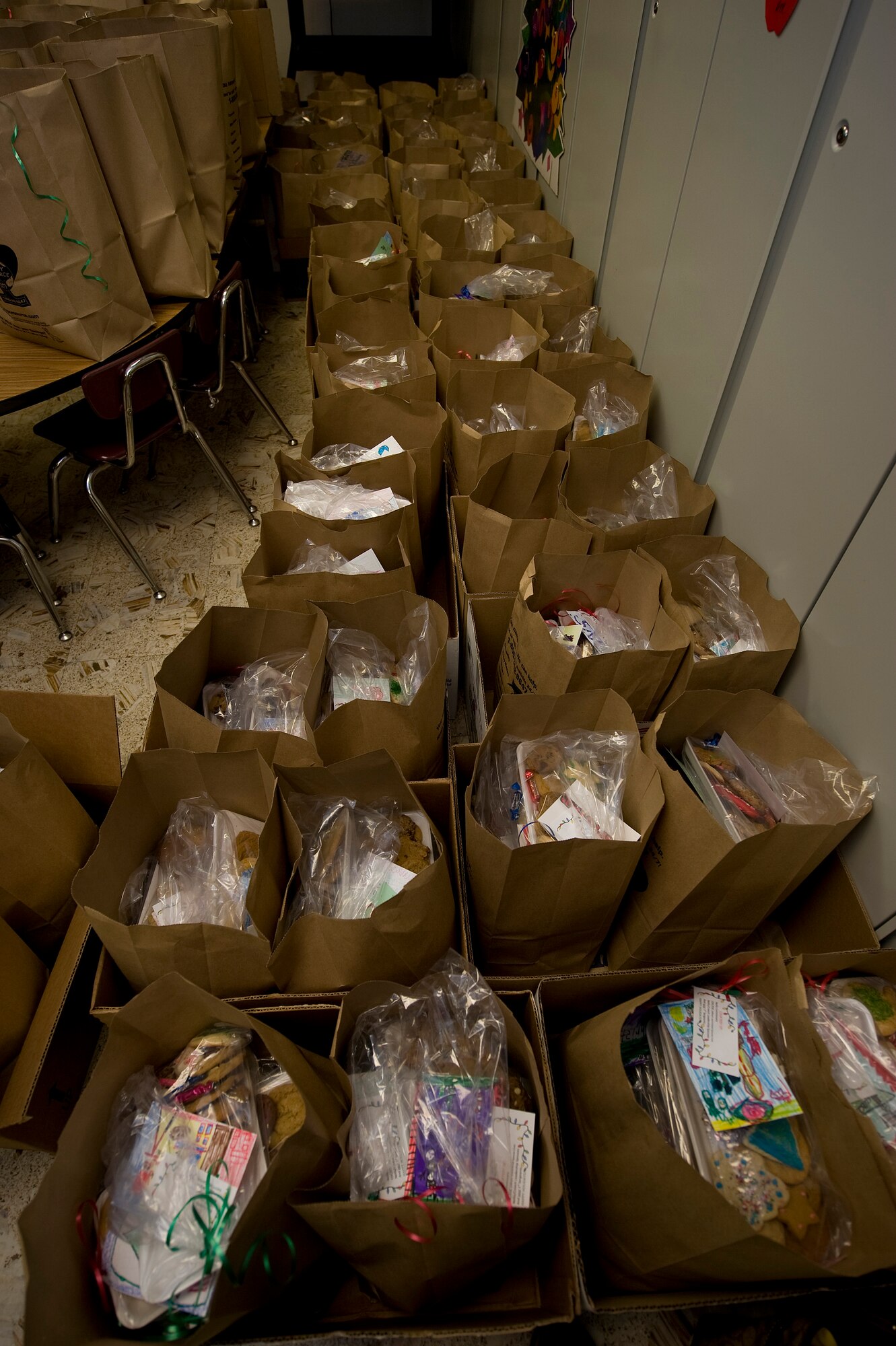 NELLIS AIR FORCE BASE, Nev. -- Bags of cookies wait to be delivered to Nellis dormitory residents during the Annual Cookie Drive Dec. 14. The cookie drive is held during the holidays for single Airmen living in the dorms. (U.S. Air Force photo by Senior Airman Brett Clashman/Released)
