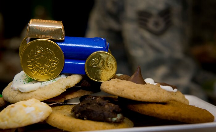 NELLIS AIR FORCE BASE, Nev. -- Volunteers and local commercial businesses baked and delivered more than 13,000 cookies for the Annual Cookie Drive Dec. 14. The cookie drive is held during the holidays for single Airmen living in the dorms. (U.S. Air Force photo by Senior Airman Brett Clashman/Released)