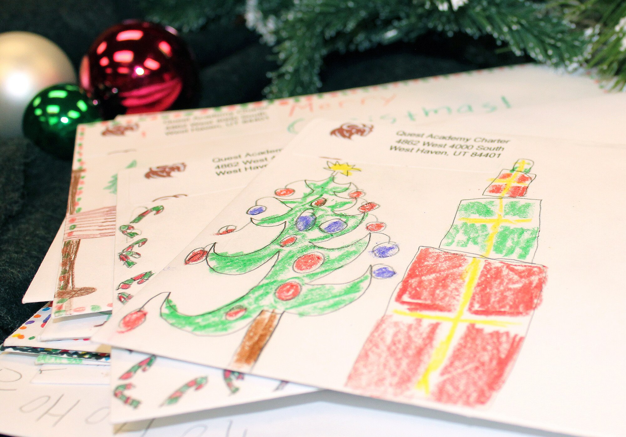 Elementary students from Quest Academy in West Haven, Utah wrote letters of thanks and Christmas greetings to service members who are serving in Afghanistan over the holidays. The 419th Fighter Wing currently has about 60 deployed personnel. (U.S. Air Force photo/Bryan Magaña)