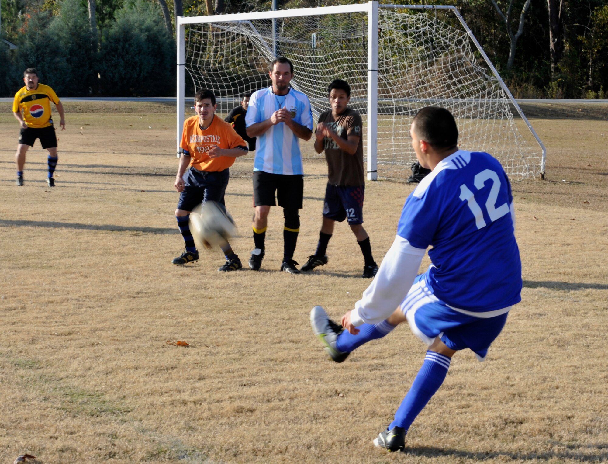 Valdosta, Ga. -- Eder Zegarra from Moody Air Force Base, Ga. shoots a penalty shot after being fouled during a game against Quitman, Ga. Dec. 12. Moody last meeting with Quitman left them at a tied score of 2-2. (U.S. Air Force photo/Airman 1st Class Nicholas Benroth)(RELEASED)
