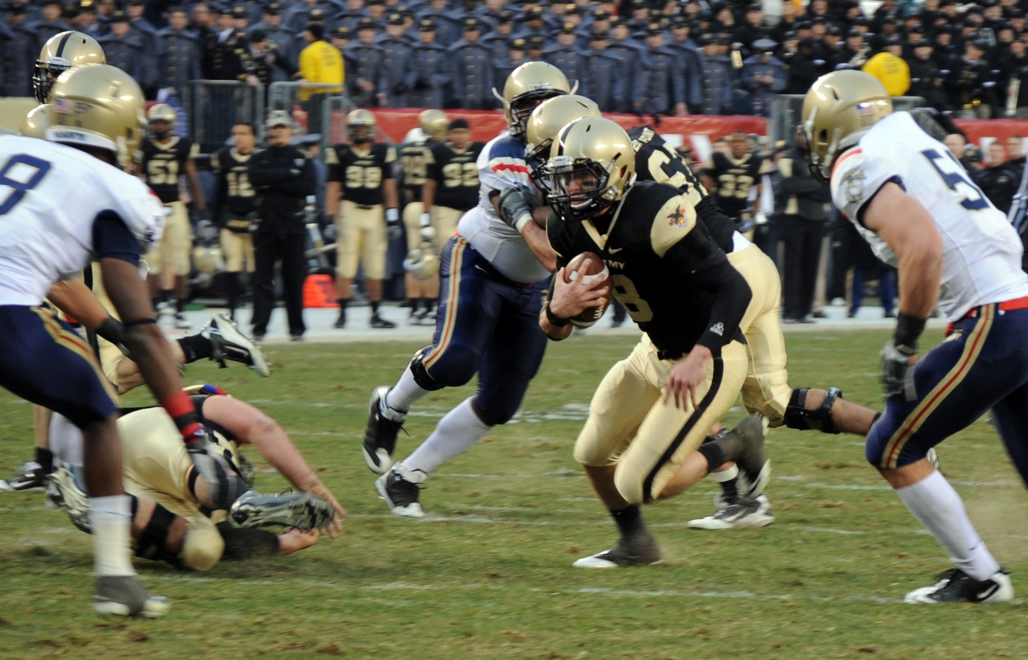 U.S. Military Academy Quarterback Trent Steelman (No. 8) sprints toward the end zone during the Army vs. Navy game Dec. 11 at Philadelphia’s Lincoln Financial Field. Steelman finished the game 11 of 20 for 128 yards and two passing touchdowns and 74 yards rushing. The Navy Midshipmen defeated the Army Black Knights 31-17 in the 111th meeting between the two academies. This was Navy’s ninth consecutive victory over rival Army.  (U.S. Air Force photo/Senior Airman David Carbajal)