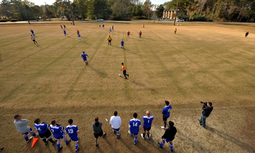 VALDOSTA, Ga.-- Players from Moody Air Force Base, Ga. watch from the sideline as the starters on the field prepare to play defense during a soccer match Dec. 12. Moody went up against a soccer team from Quitman, Ga., who they tied during their last match. (U.S. Air Force photo/Airman 1st Class Joshua Green)(RELEASED)
