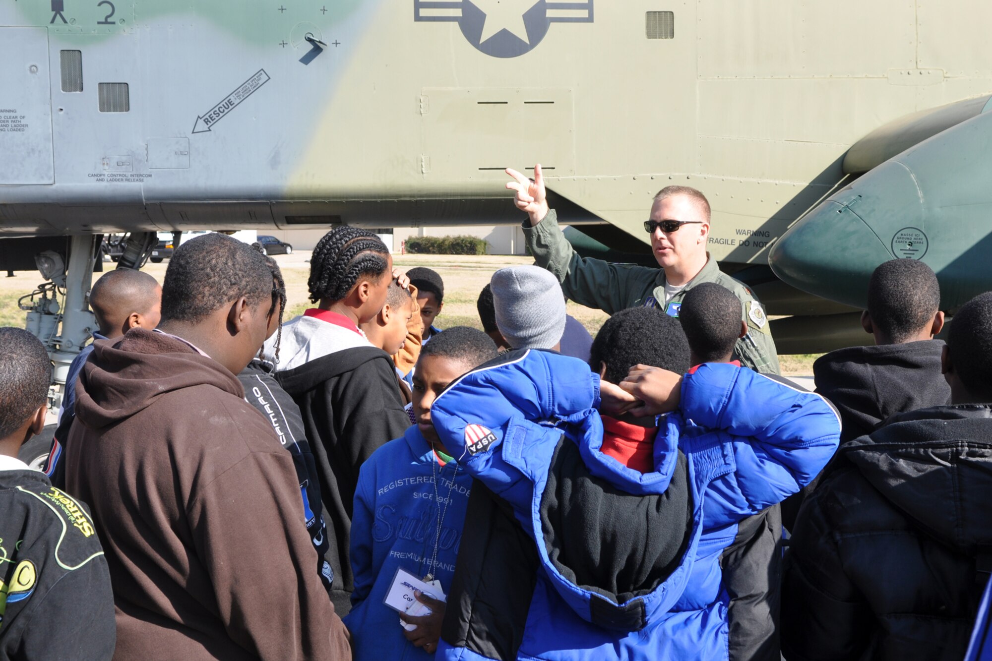 Maj. Maurice J. Kent, A-10 fighter pilot, 917th Operations Support Squadron, fields questions from a group of Caddo Heights Elementary School 5th Grade students during a briefing about the A-10 Thunderbolt II at Barksdale Air Force Base, La., Dec. 10, 2010. The students are attending STARBASE Louisiana, at Barksdale, one of 60 national STARBASE sites. It is sponsored by the 917th Wing of the Air Force Reserve Command. The program presents an exciting 25-hour hands on/minds on aviation and aerospace curriculum to area 5th grade students and their teachers. The DoD program is committed to addressing the critical needs in STEM education - Science, Technology, Engineering and Mathematics - STARBASE Louisiana introduces its students to exciting STEM education topics, inspiring these young minds to further explore these topics in future course work. Meadowview Elementary is part of the Bossier Parish School System. (U.S. Air Force photo/Tech. Sgt. Jeff Walston)