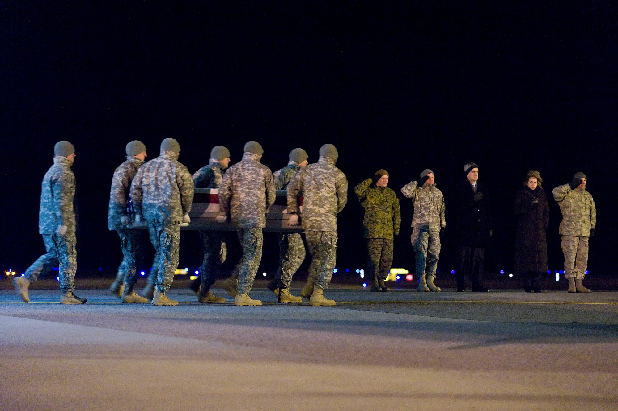 A U.S. Army carry team transfers the remains of Army Spc. Ethan L. Goncalo, of Fall River, Mass., at Dover Air Force Base, Del., Dec. 13, 2010. Goncalo was assigned to the 1st Battalion, 181st Infantry Regiment, Worchester, Mass. (U.S. Air Force photo/Roland Balik)
