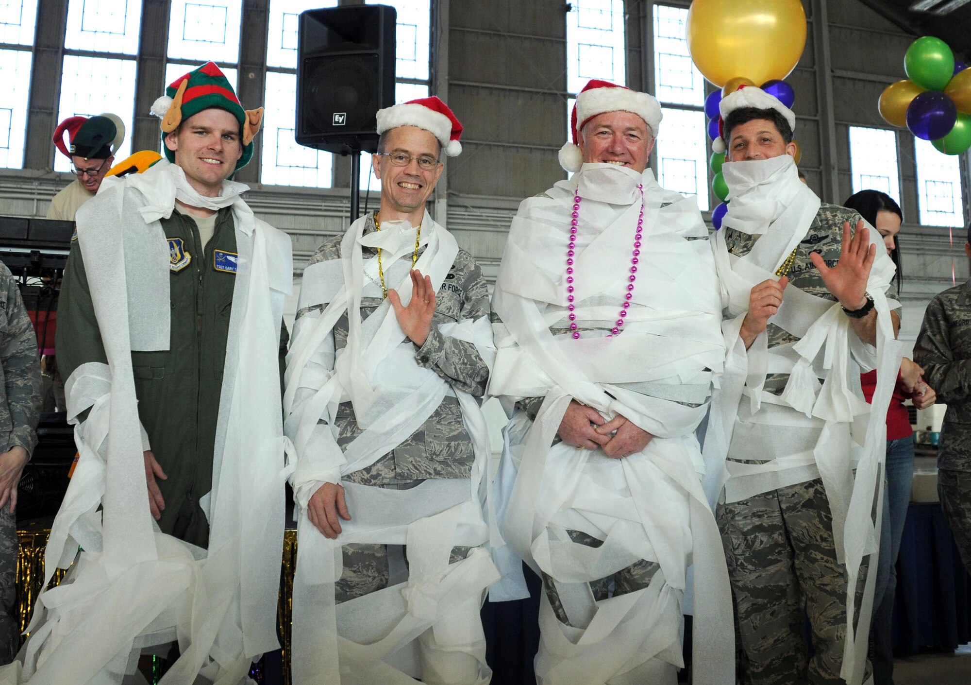 MacDill Air Force Base, Fla. -- As part of the holiday celebration, members of the 927th Air Refueling Wing made snowmen.  When no snow was available in Tampa, toilet paper sufficed.  The 'snowmen' found themselves looking like Frosty the Snowman by the end of the event. (Official United States Air Force photo by Staff Sgt. Shawn C. Rhodes)